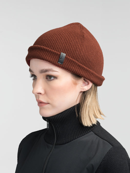Ardn Unisex Tailored Reversible Knit Beanie in an extra fine merino wool blend, fitted rib knit, and reversible design, in Potent Purple/Rio Red