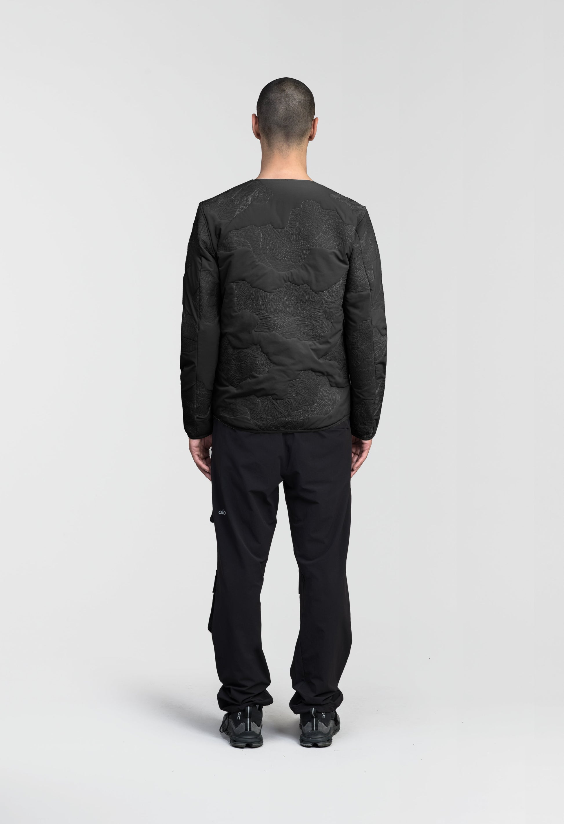 Gates Men's Performance Quilted V-Neck Jacket in hip length, centre front two-way zipper, hidden zipper chest pockets, side entry waist pockets, in Black