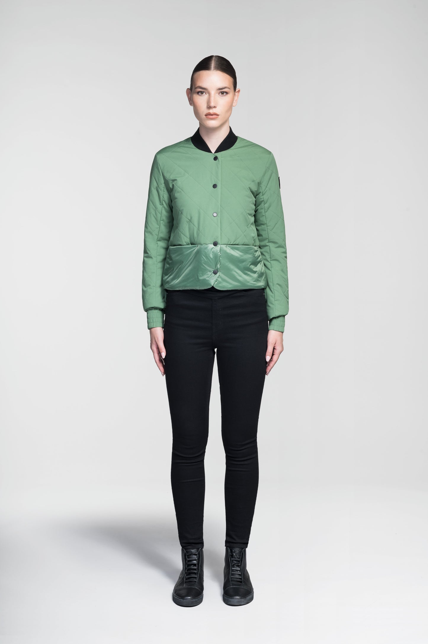 Lexi Women's Reversible Midlayer Jacket in waist length, premium stretch ripstop and contrast cire technical nylon taffeta fabrication, premium 4-way stretch, water resistant Primaloft Gold Insulation Active+, snap button closure at centre front, exterior magnetic closure pockets at sides, elasticized cuff details, and reversible from a quilted or smooth outer shell, in Comfrey