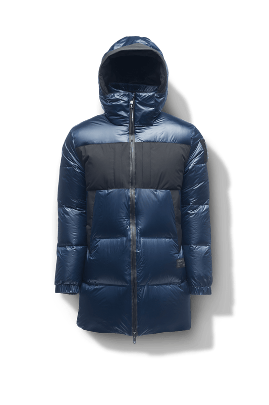 Neelix Men's Long Puffer Jacket in thigh length, premium cire technical nylon taffeta and stretch ripstop fabrication, Premium Canadian origin White Duck Down insulation, non-removable down-filled hood, two-way centre-front zipper, pit zipper vents, hidden chest zipper pockets, fleece-lined magnetic closure waist pockets, in Marine + Marine