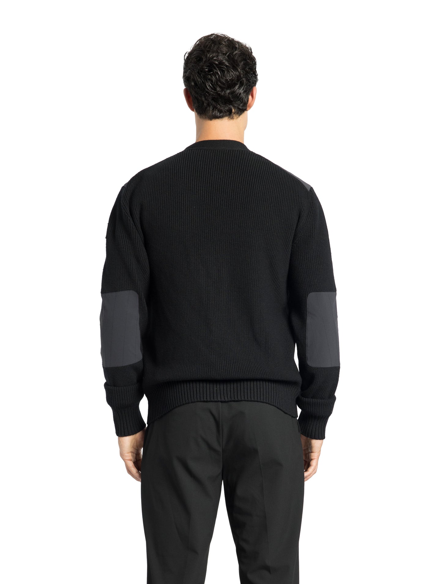 Watson Men's Hybrid V-Neck Sweater in hip length, premium stretch ripstop and 100% virgin extra fine merino wool knit fabrication, Primaloft Gold Insulation Active+, button front closure, snap button closure flap pockets at waist with additional side-entry, in Black