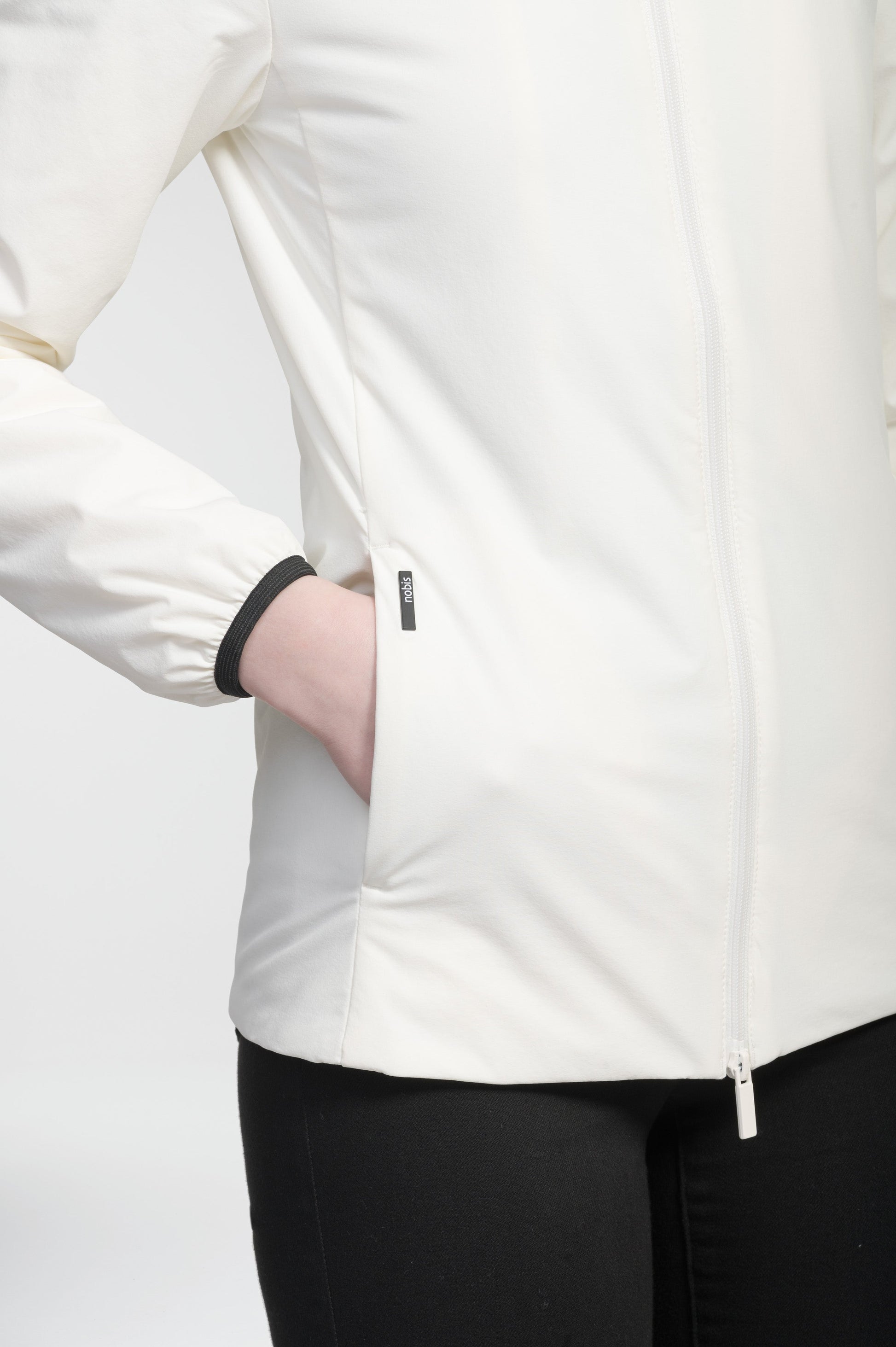 Ladies hip length mid layer jacket with non-removable hood and two-way zipper in Chalk