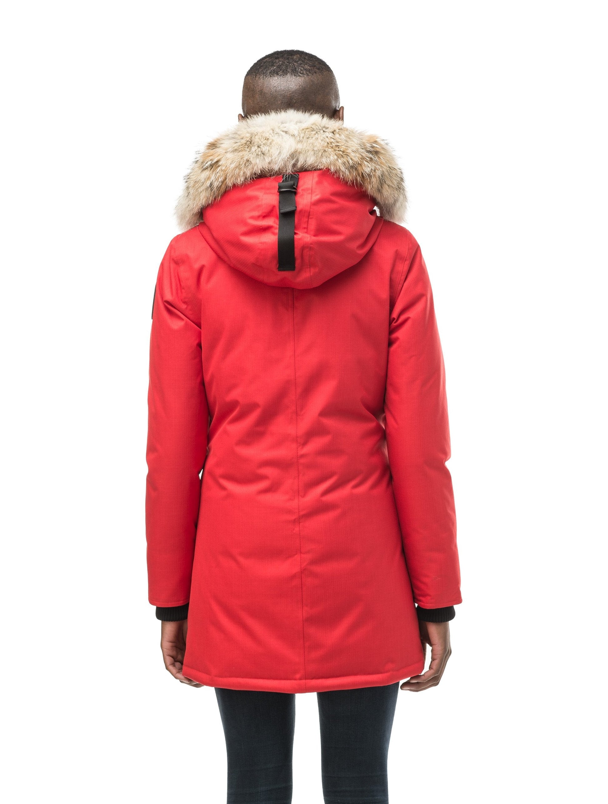 Women's down filled parka that sits just below the hip with a clean look and two hip patch pockets in CH Red