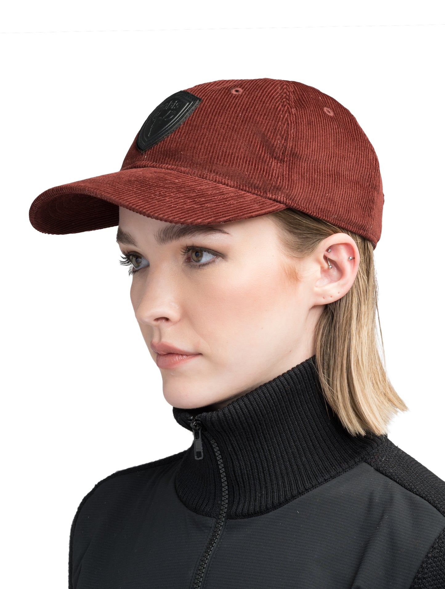 Carter Unisex Tailored Ball Cap in 100% cotton corduroy, unstructured crown, curved brim, and leather strap back with metal buckle closure, in Rio Red