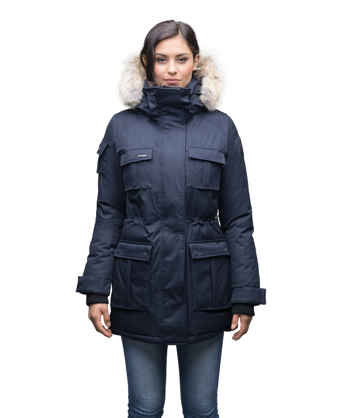 Women's down filled thigh length parka with four pleated patch pockets and an adjustable waist in Navy
