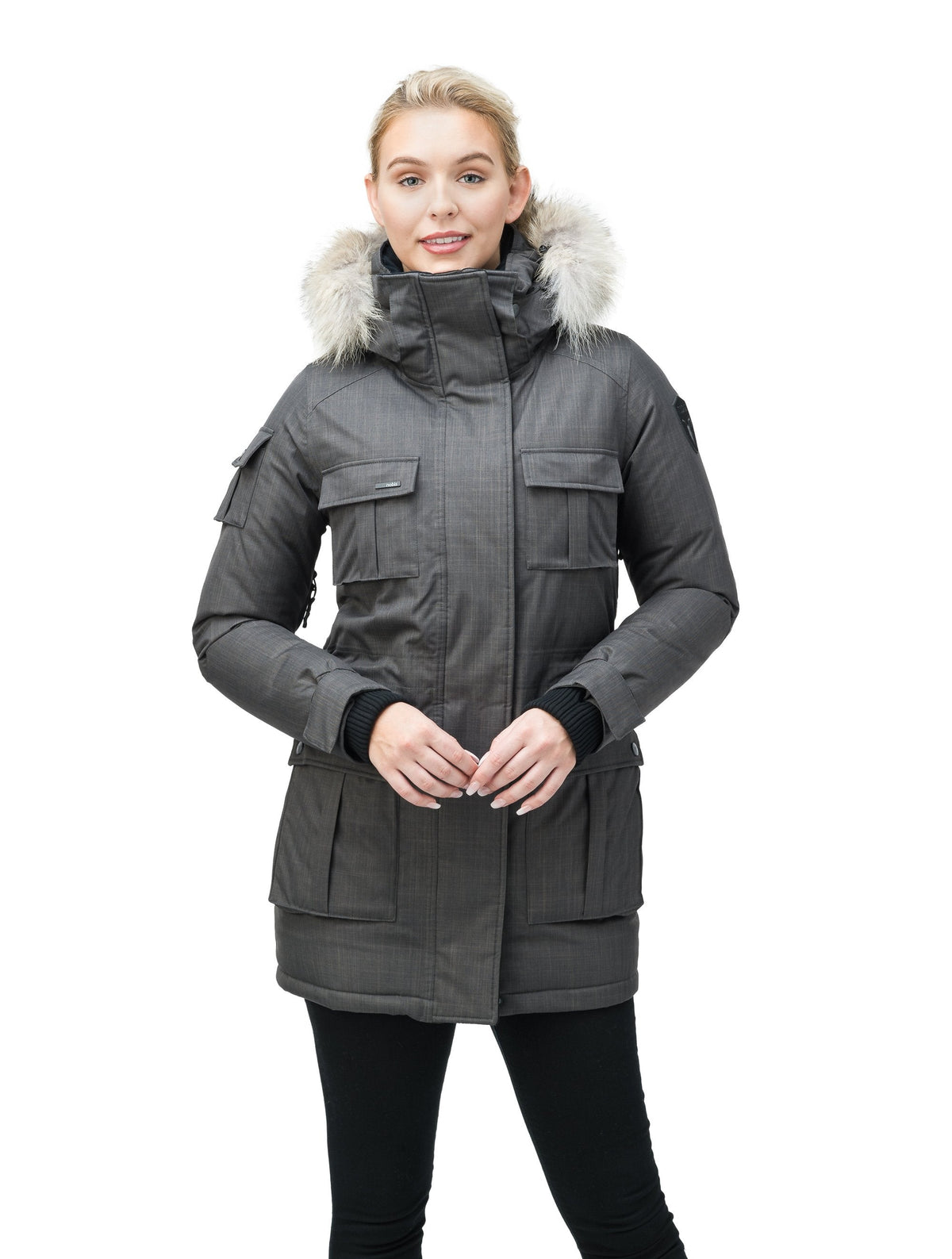 Women's down filled thigh length parka with four pleated patch pockets and an adjustable waist in Steel Grey