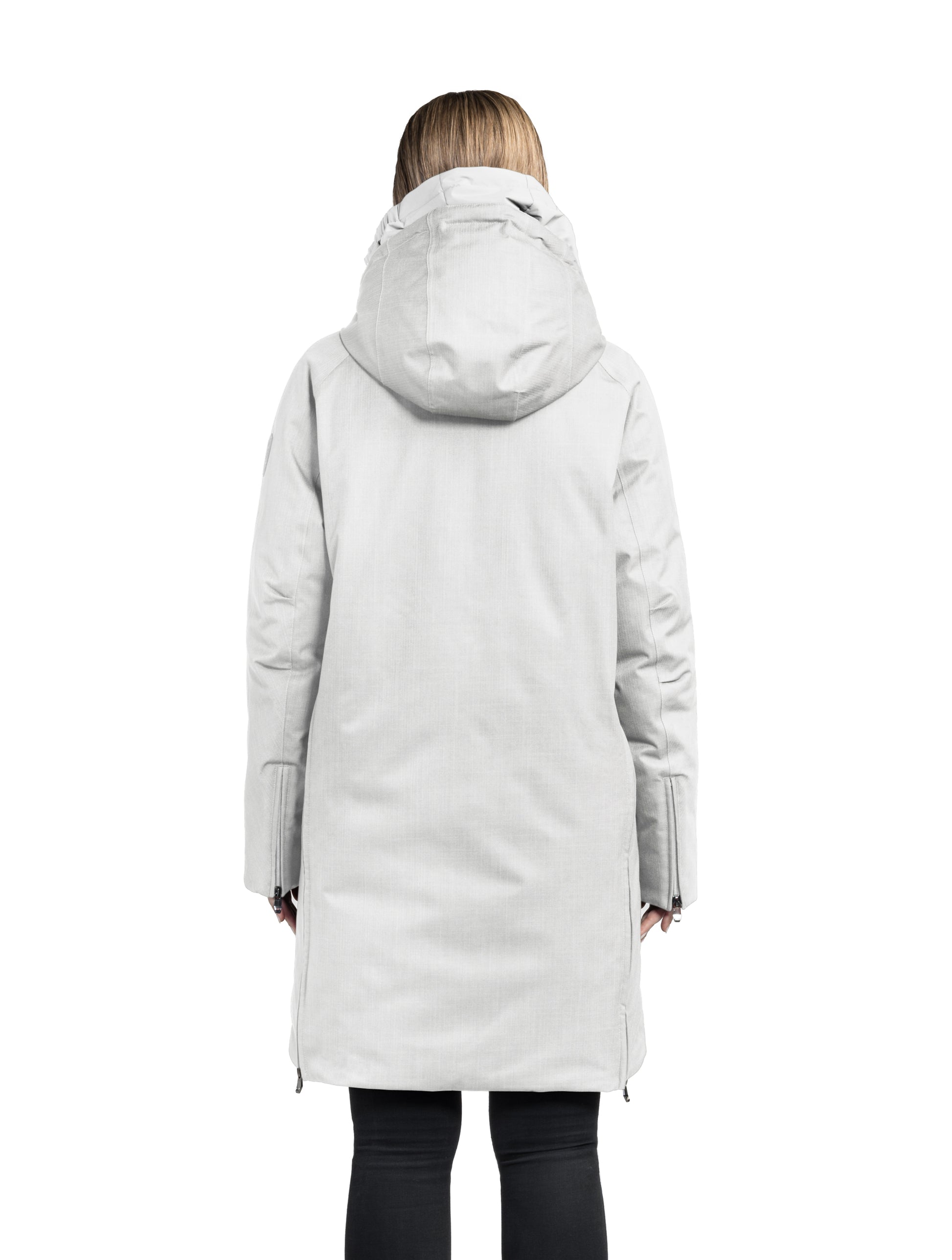 Dory Women's Tailored Back Zip Parka in knee length, premium Crosshatch fabrication, Premium Canadian White Duck Down insulation, non-removable down-filled hood, removable interior hood, centre front two-way zipper with wind flap, vertical zipper detailing along back, in Light Grey
