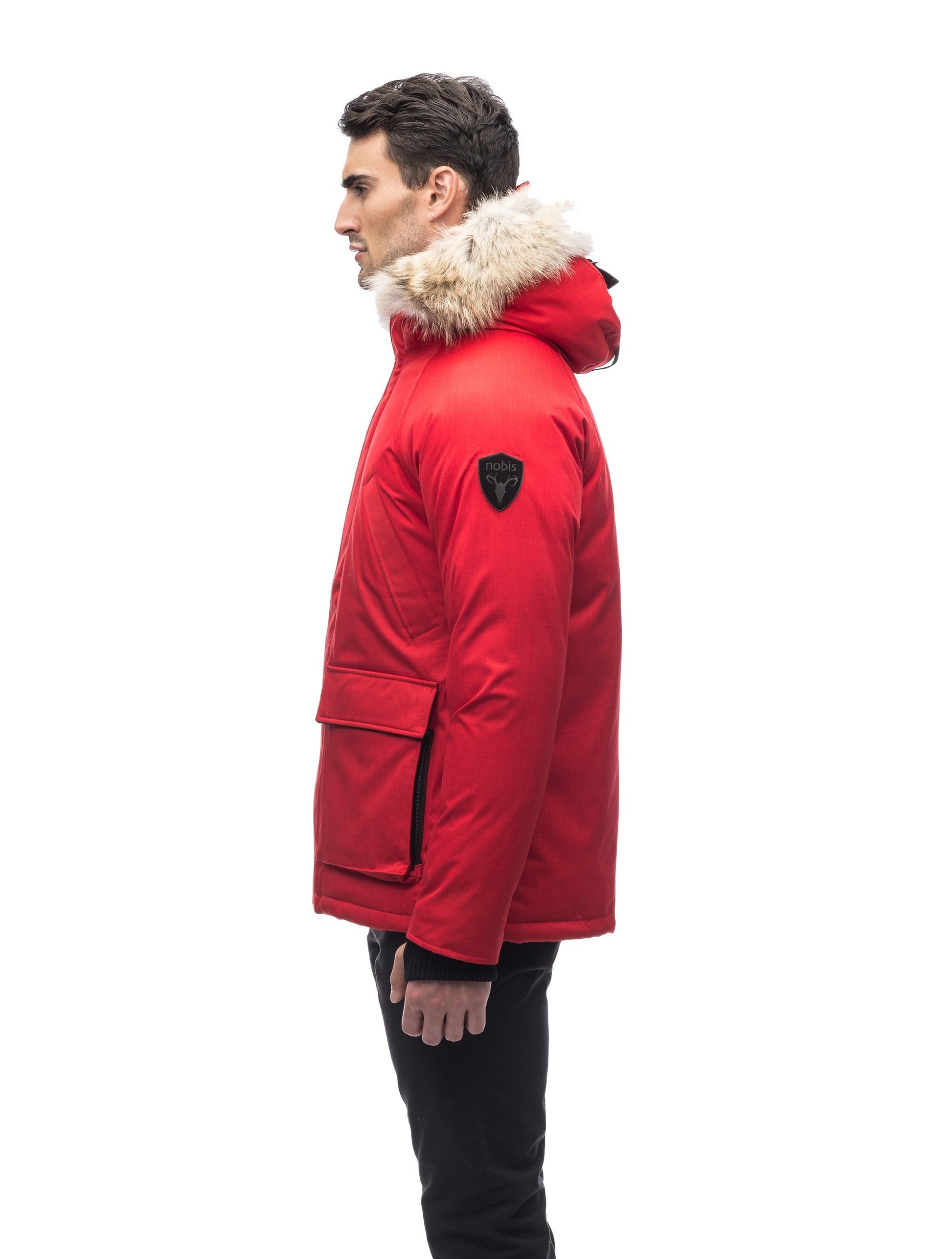 Men's waist length down filled jacket with two front pockets with magnetic closure and a removable fur trim on the hood in CH Red