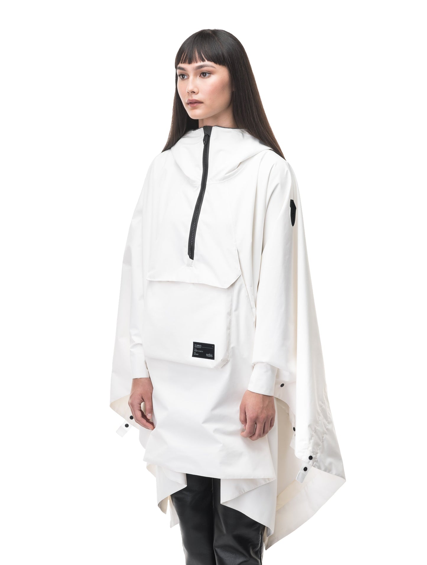 Hydra Unisex Performance Poncho in thigh length, non-removable hood, vertical half-zipper along centre front collar, hidden side-entry waist zipper pockets, adjustable webbing straps and snap closure cuffs, and packable to front kangaroo pocket with flap opening, in Chalk