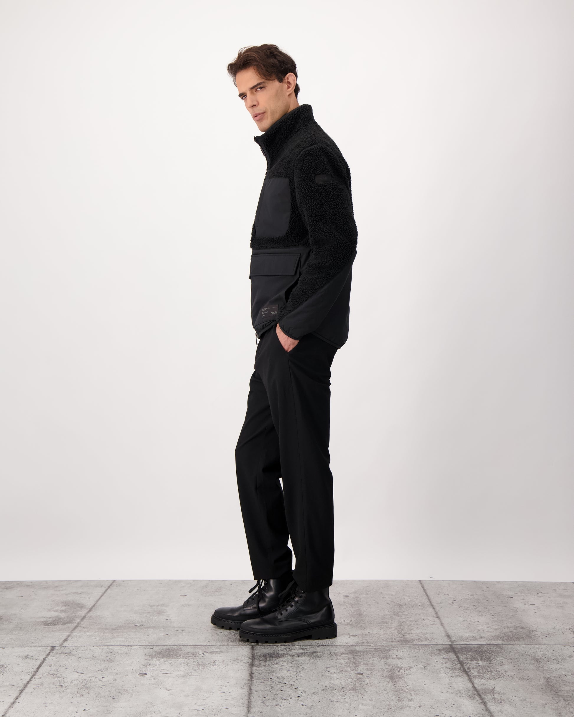 Kepler Men's Berber Zip Front Sweater in hip length, premium berber and stretch ripstop fabrication, Primaloft Gold Insulation Active+, two-way centre-front zipper, zipper pocket at left chest, magnetic closure flap pockets at waist with additional side-entry pockets, in Black