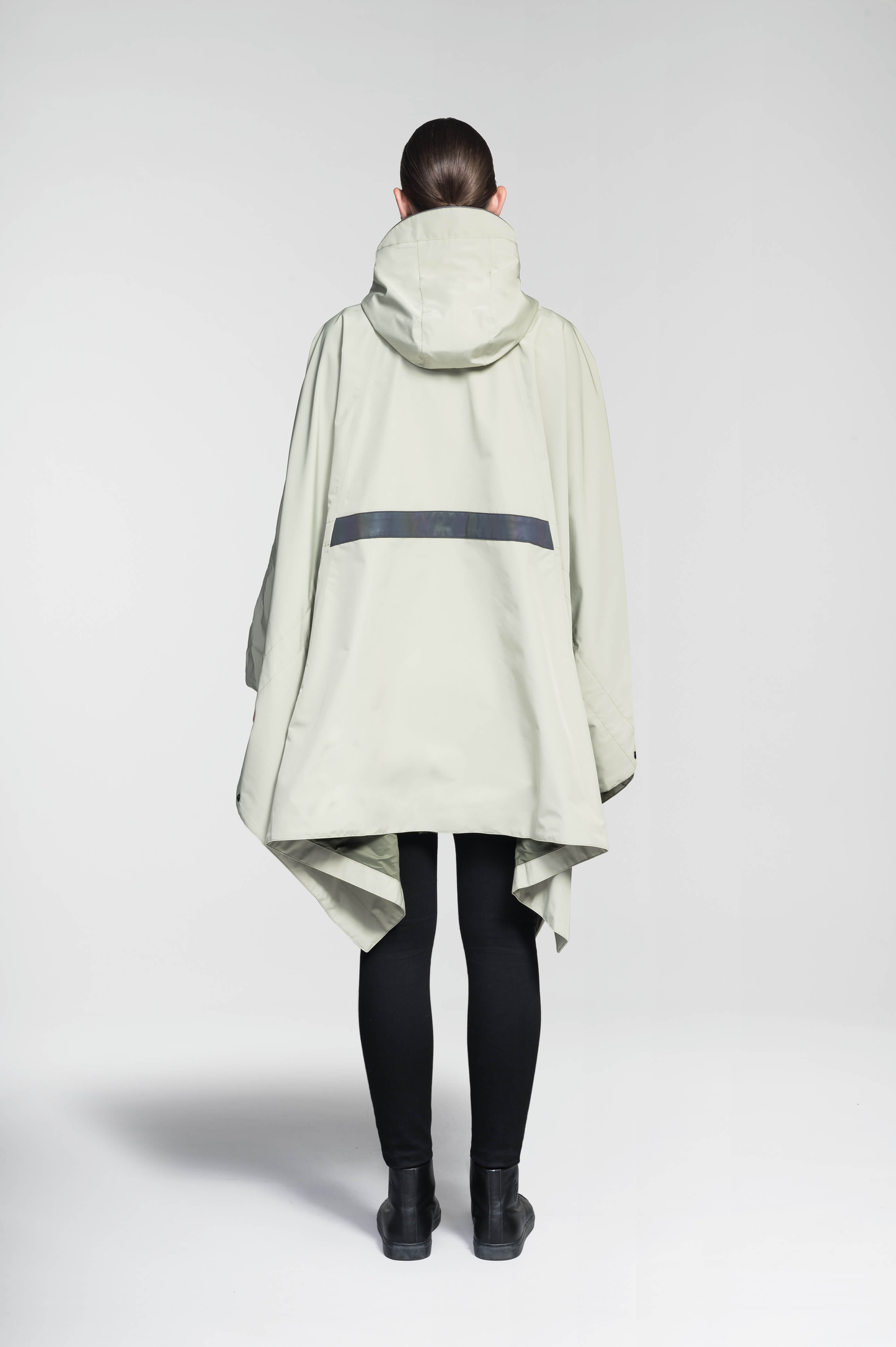 Hydra Unisex Performance Poncho in thigh length, non-removable hood, vertical half-zipper along centre front collar, hidden side-entry waist zipper pockets, adjustable webbing straps and snap closure cuffs, and packable to front kangaroo pocket with flap opening, in Tea