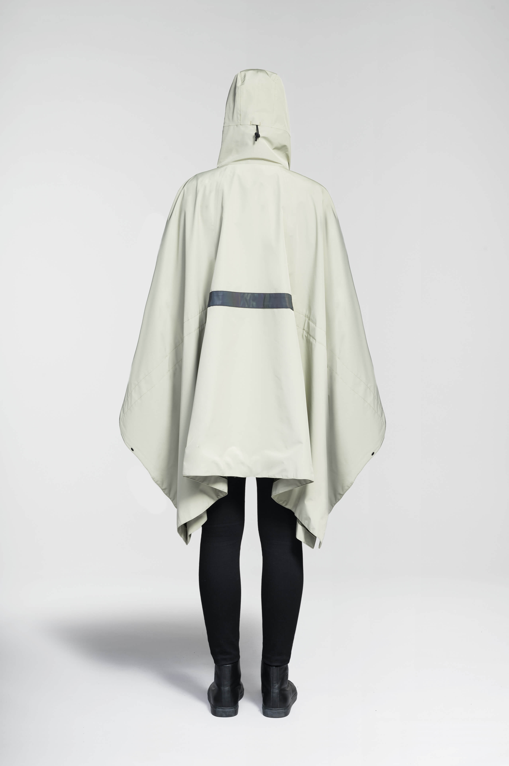 Hydra Unisex Performance Poncho in thigh length, non-removable hood, vertical half-zipper along centre front collar, hidden side-entry waist zipper pockets, adjustable webbing straps and snap closure cuffs, and packable to front kangaroo pocket with flap opening, in Tea