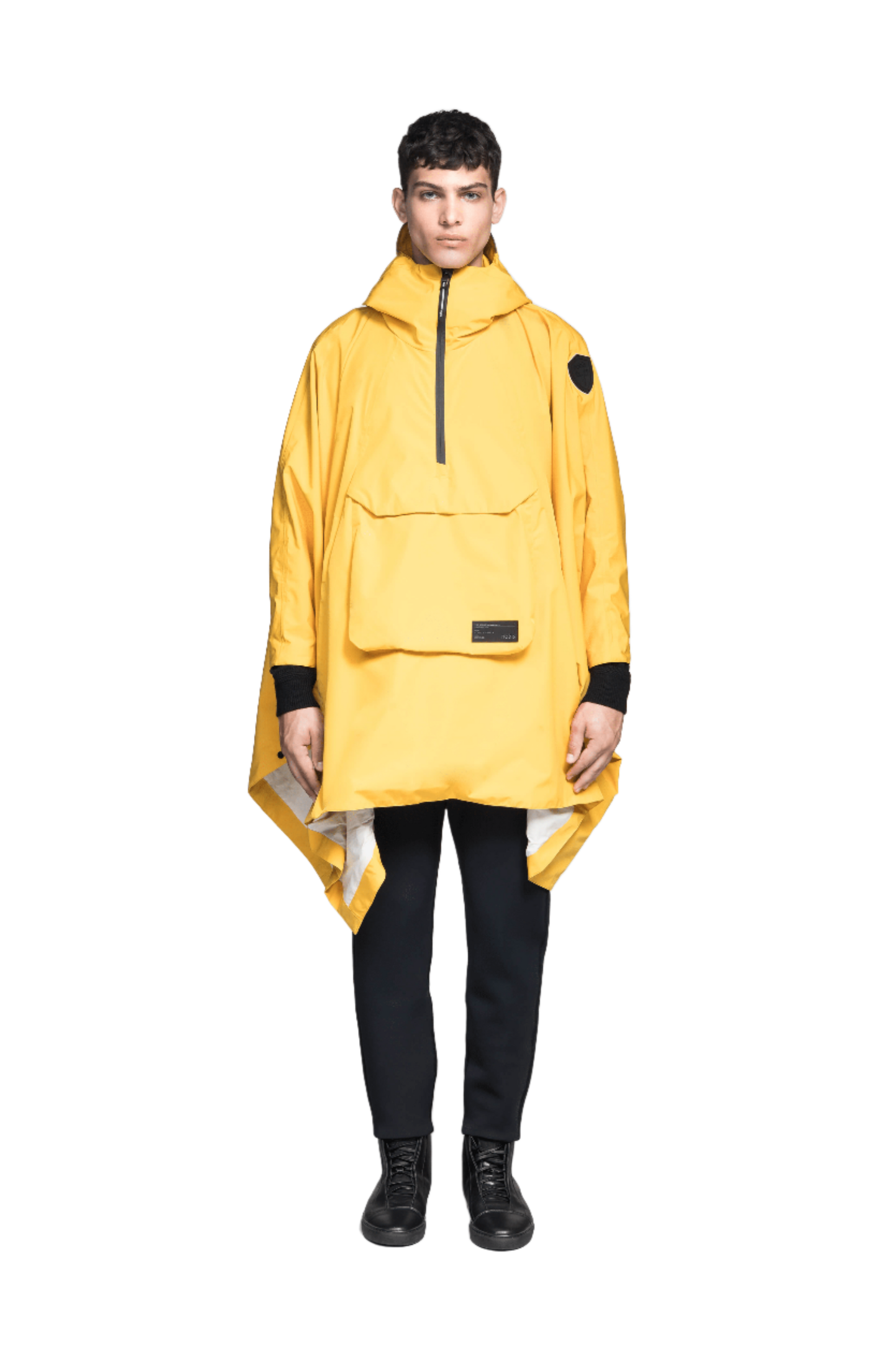 Hydra Unisex Performance Poncho in thigh length, non-removable hood, vertical half-zipper along centre front collar, hidden side-entry waist zipper pockets, adjustable webbing straps and snap closure cuffs, and packable to front kangaroo pocket with flap opening, in Old Gold