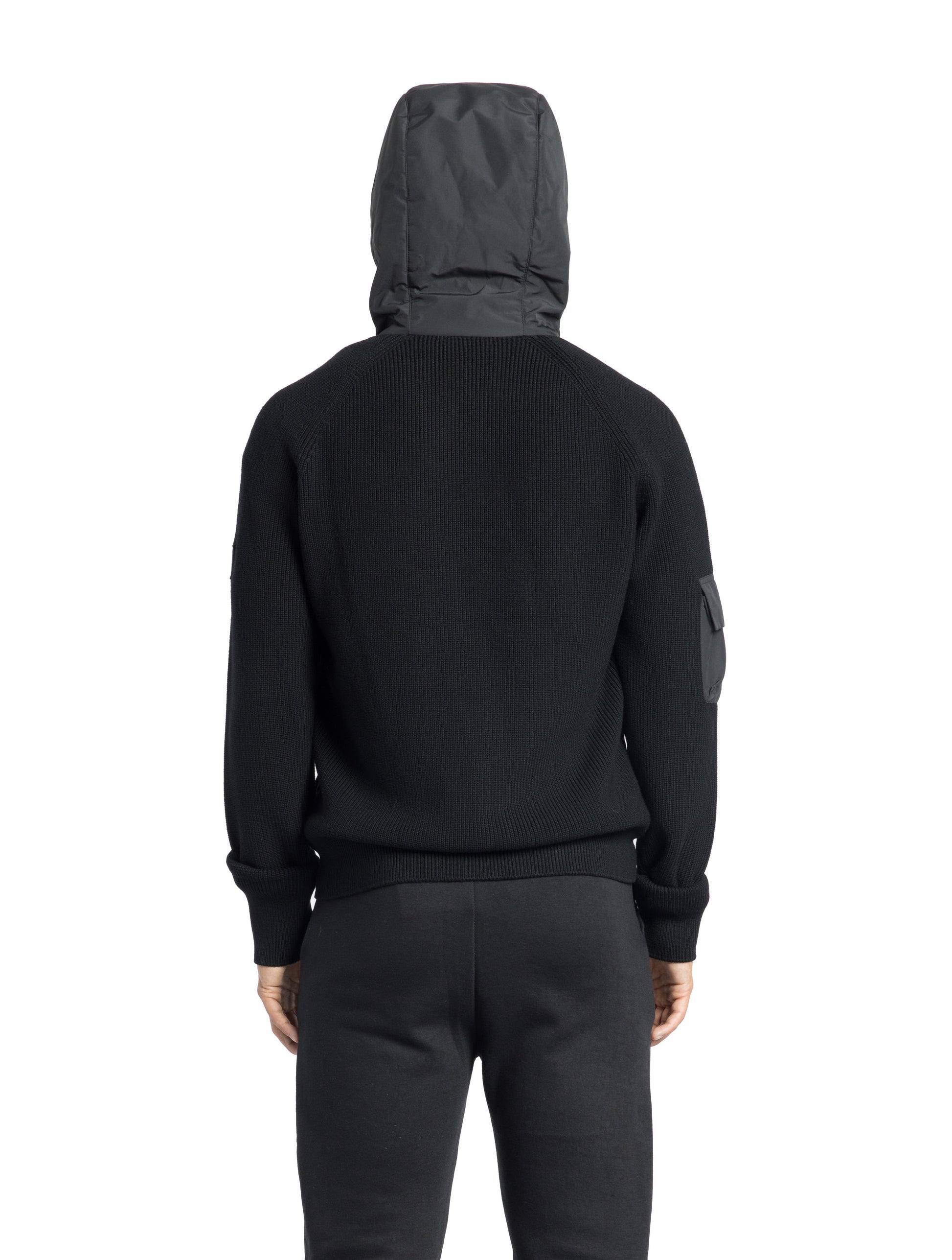 Hedge Men's Performance Hoodie in hip length, premium 3-ply micro denier and 100% virgin extra fine merino wool knit fabrication, Primaloft Gold Insulation Active+, non-removable hood with adjustable drawstrings, two-way centre-front zipper, magnetic closure side-entry pockets at waist, in Black