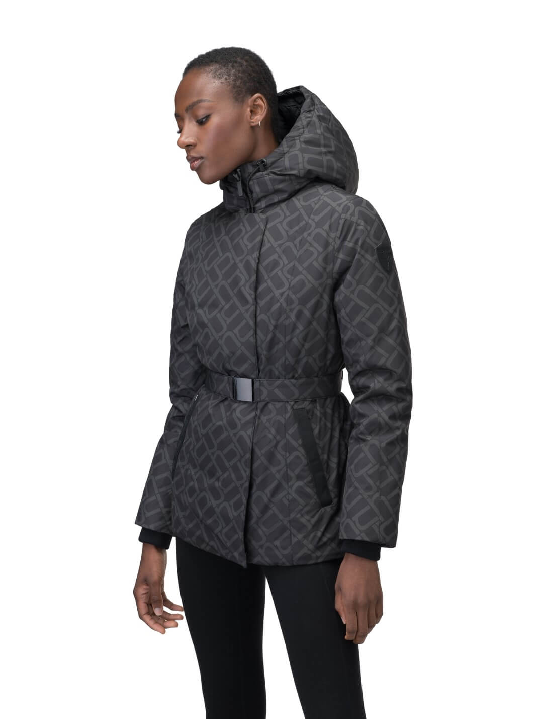 Ladies hip length down-filled parka with non-removable hood and adjustable belt in Dark Monogram