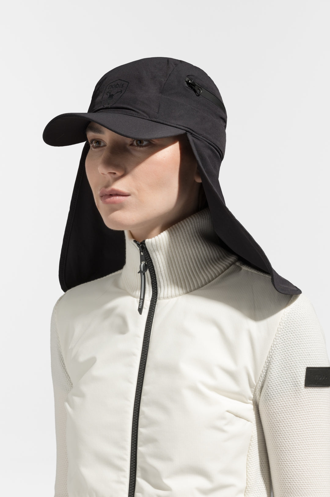 Tal Unisex 3-in-1 cap in 5-panel construction, curved peak brim, back flap, adjustable cobra buckle at back, zipper pocket on left side crown, and detachable face covering, in Black
