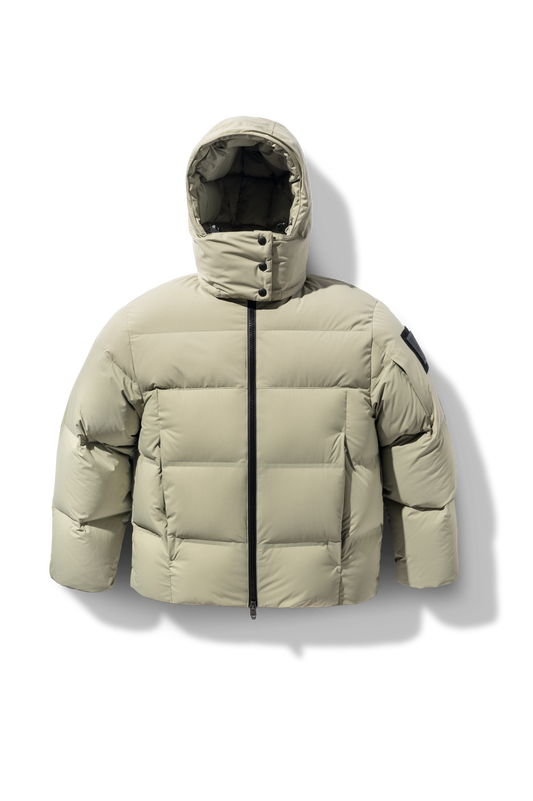 Una Ladies Performance Puffer in hip length, Technical Taffeta and Durable Stretch Ripstop fabrication, Premium Canadian White Duck Down insulation, removable down filled hood, centre front two-way zipper, and side-entry pockets at waist, in Tea + Tea