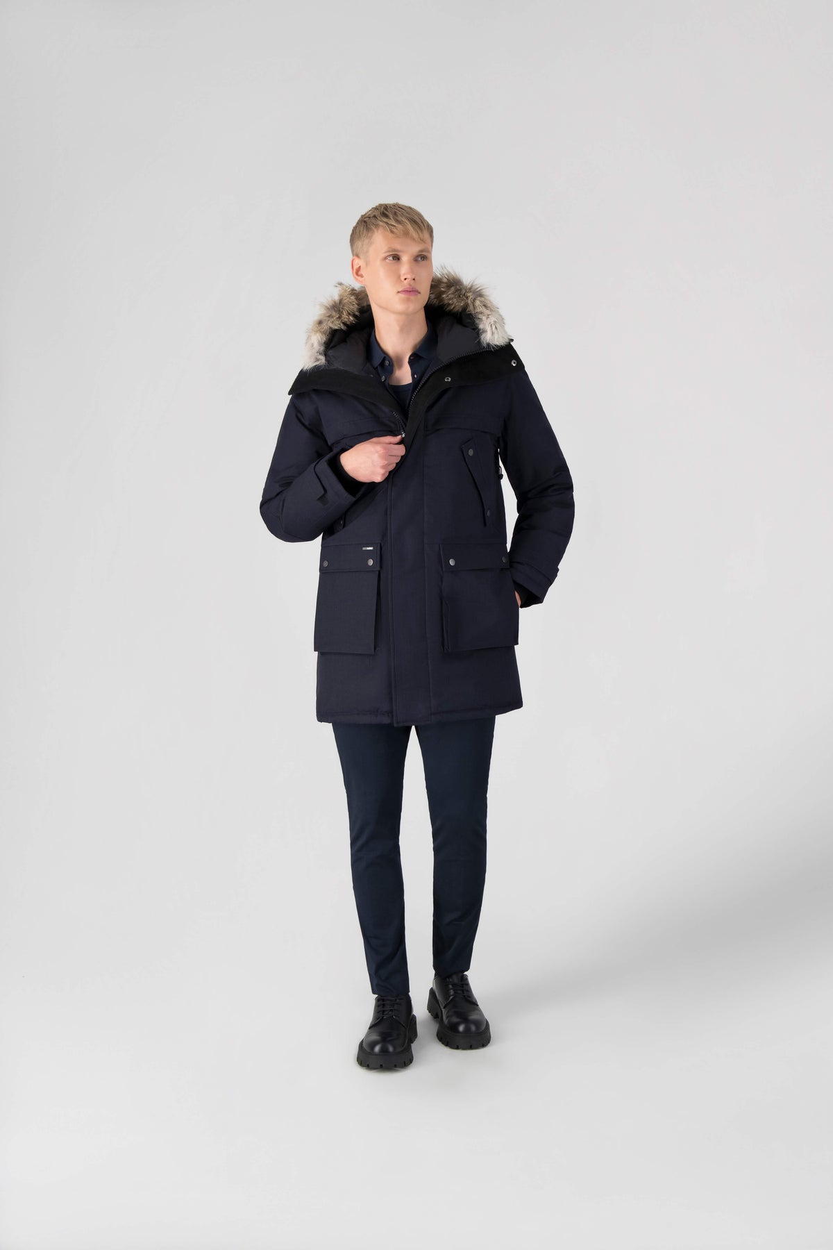 Men's Best Selling Parka the Yatesy is a down filled jacket with a zipper closure and magnetic placket in Navy