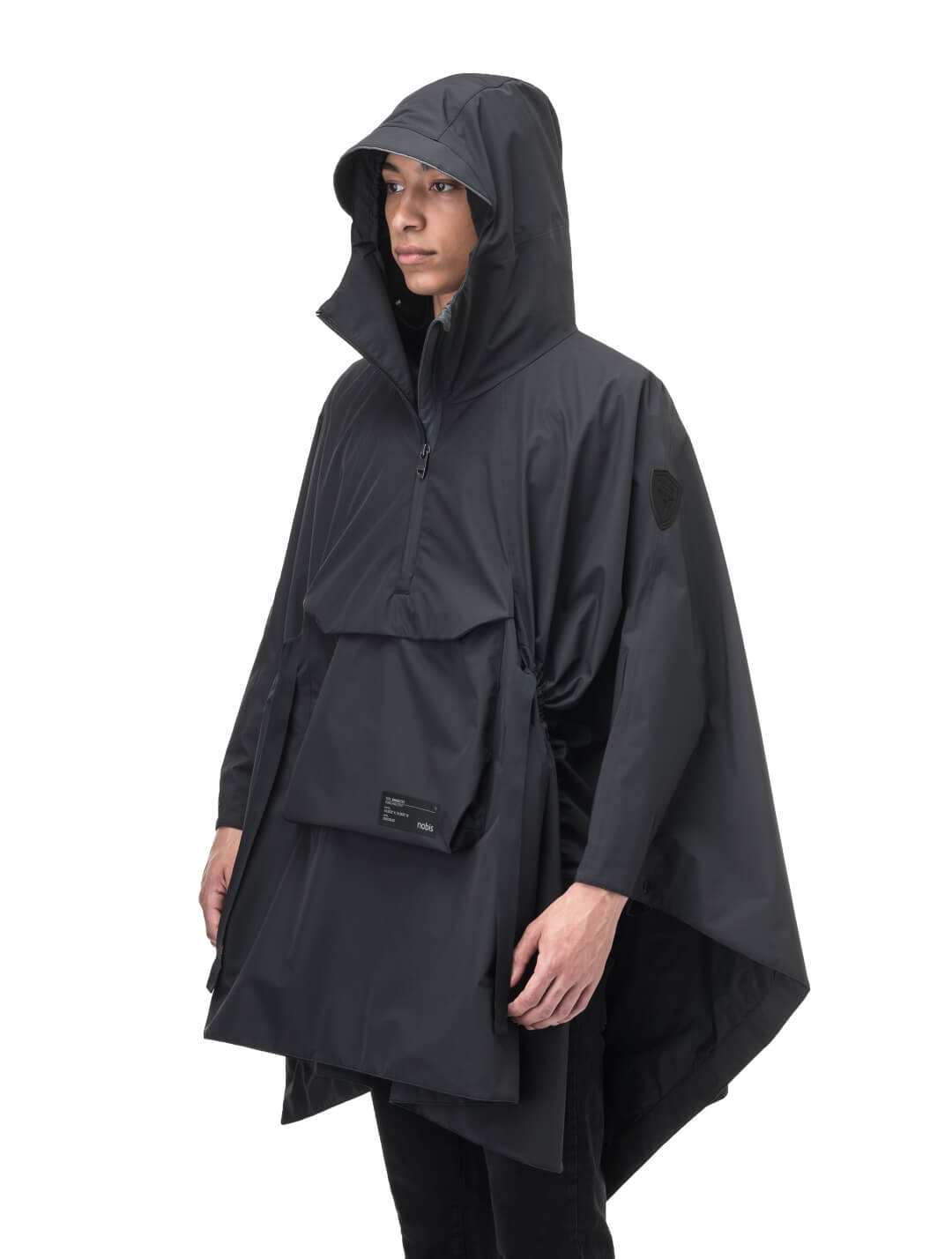 Hydra Unisex Performance Poncho in thigh length, non-removable hood, vertical half-zipper along centre front collar, hidden side-entry waist zipper pockets, adjustable webbing straps and snap closure cuffs, and packable to front kangaroo pocket with flap opening, in Black