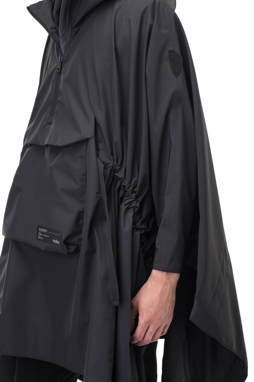 Hydra Unisex Performance Poncho in thigh length, non-removable hood, vertical half-zipper along centre front collar, hidden side-entry waist zipper pockets, adjustable webbing straps and snap closure cuffs, and packable to front kangaroo pocket with flap opening, in Black