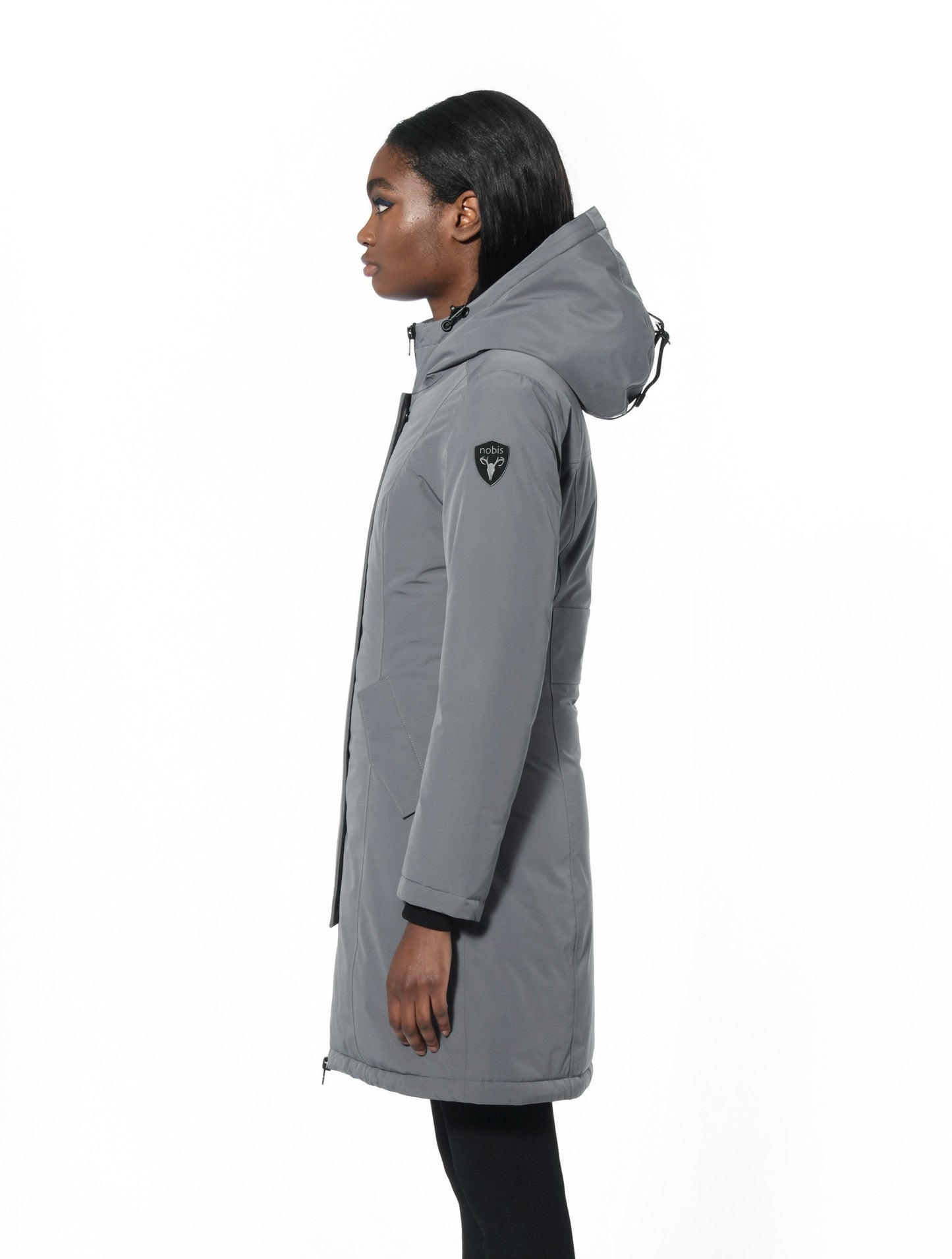 Ladies thigh length down-filled parka with non-removable hood and removable coyote fur trim in Concrete