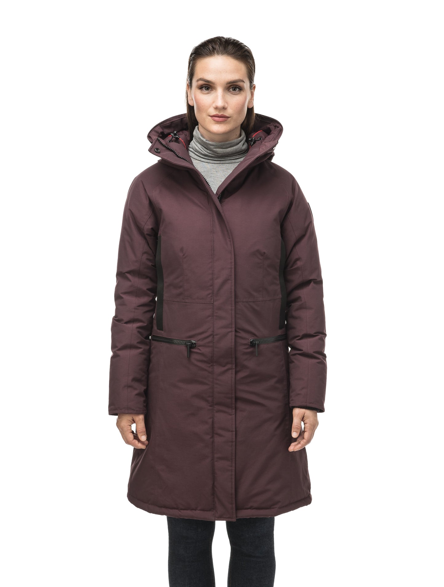 Knee length women's down filled parka with contrast ribbon accents and removable fur trim on the hood in Burgundy