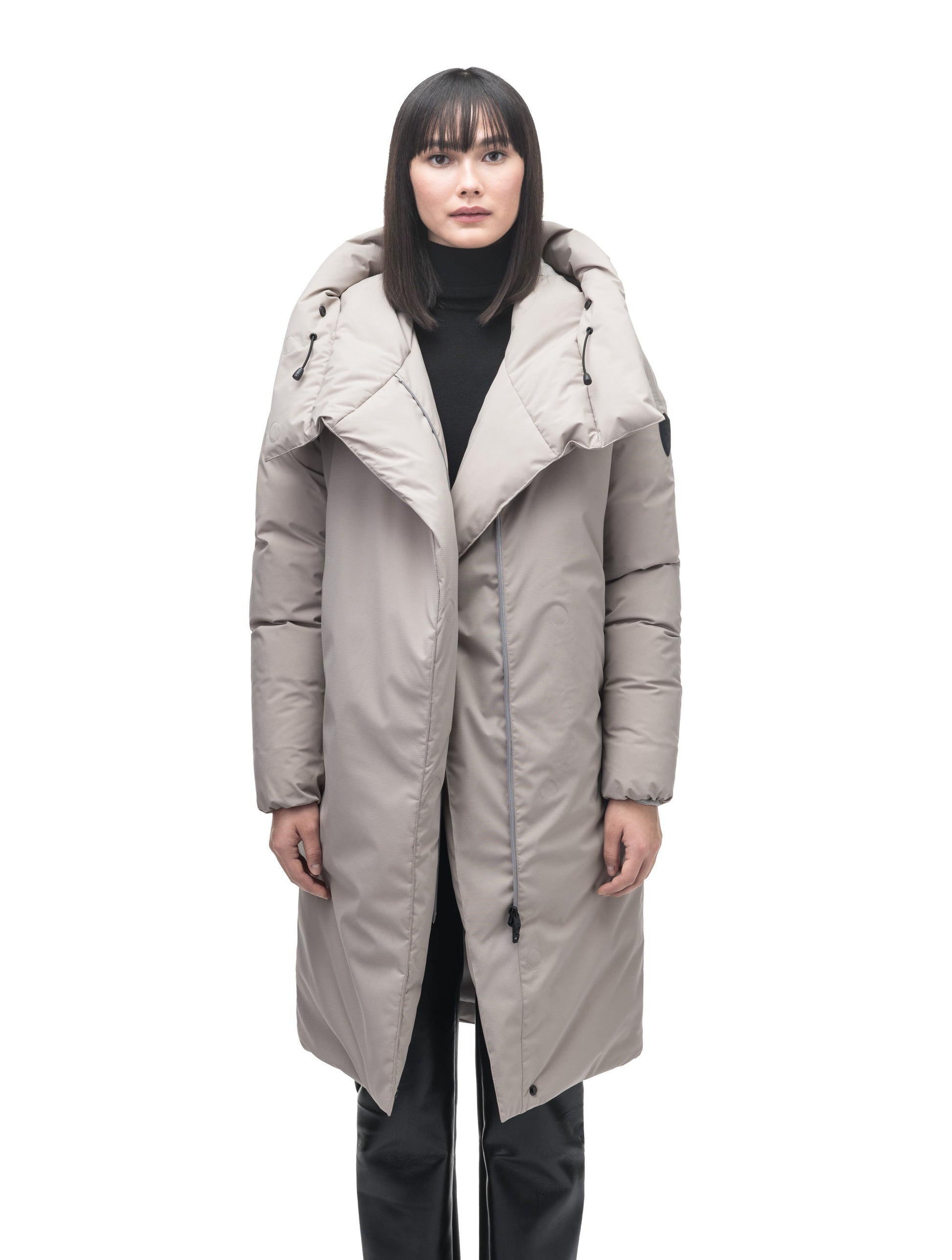 Axis Ladies Oversized Coat in knee length, Canadian duck down insulation, and two-way front zipper, in Clay