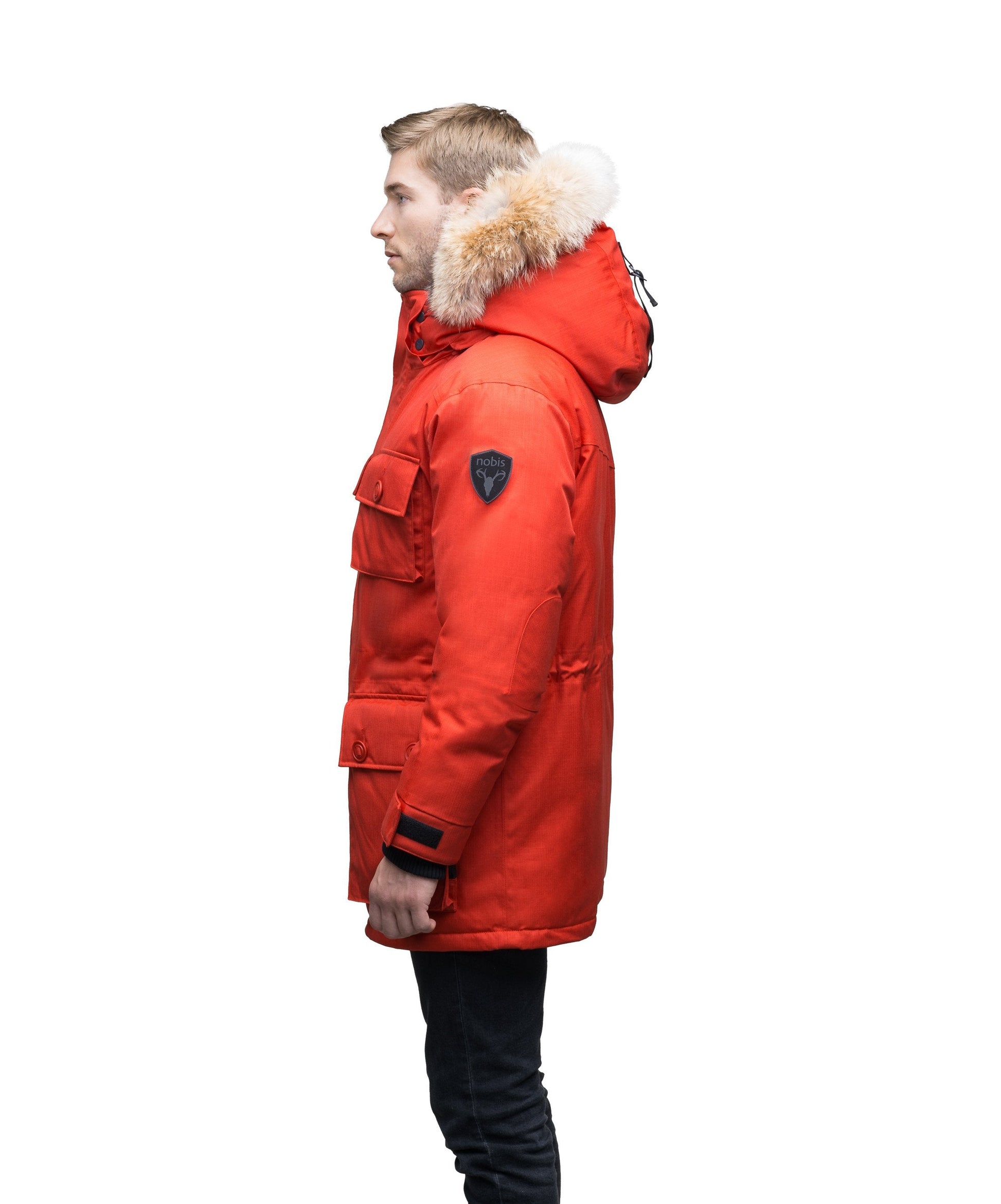 Men's down filled parka with four patch pockets and an adjustable waist with removable hood and removable fur trim in CH Red