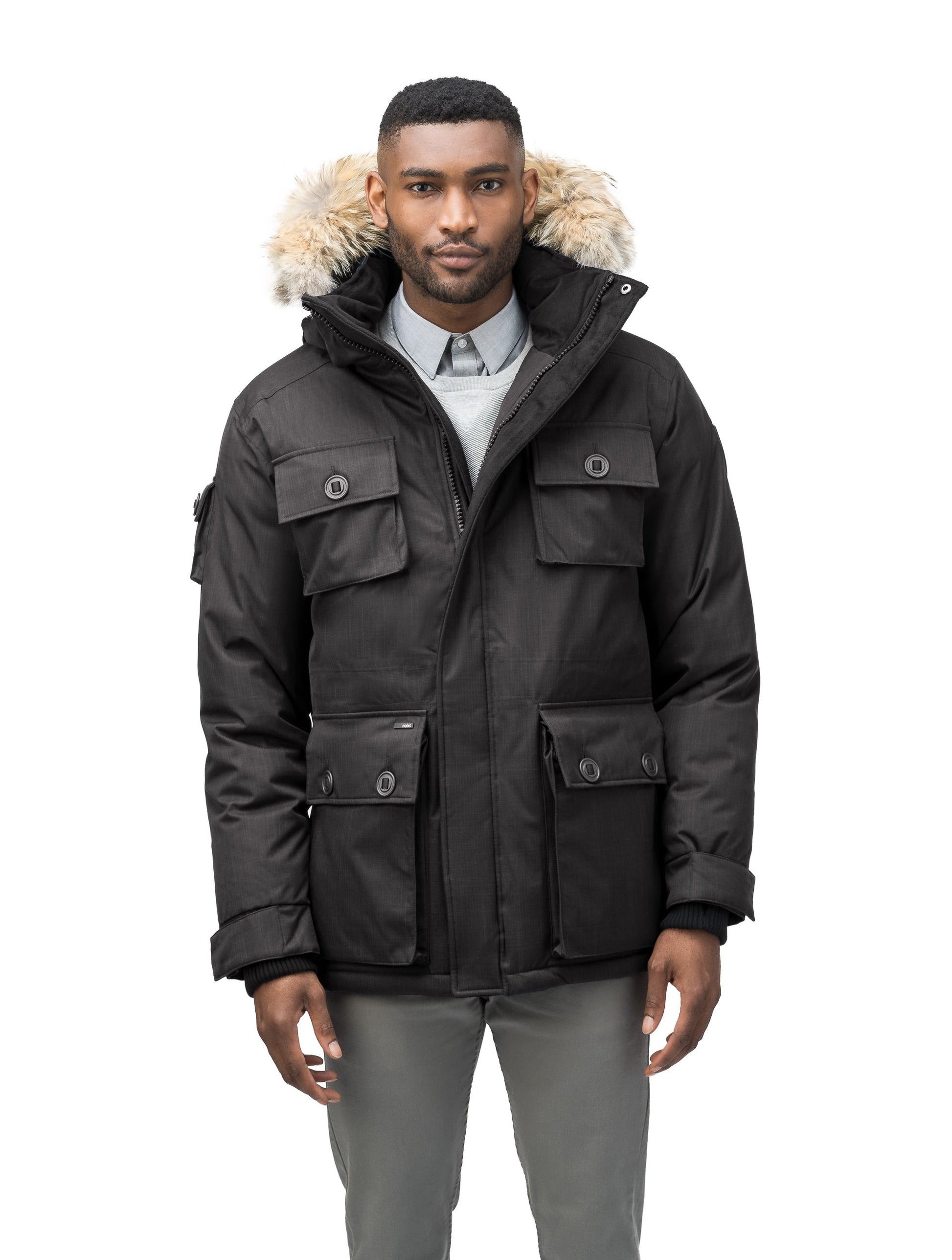 Men's down filled parka with four patch pockets and an adjustable waist with removable hood and removable fur trim in CH Black