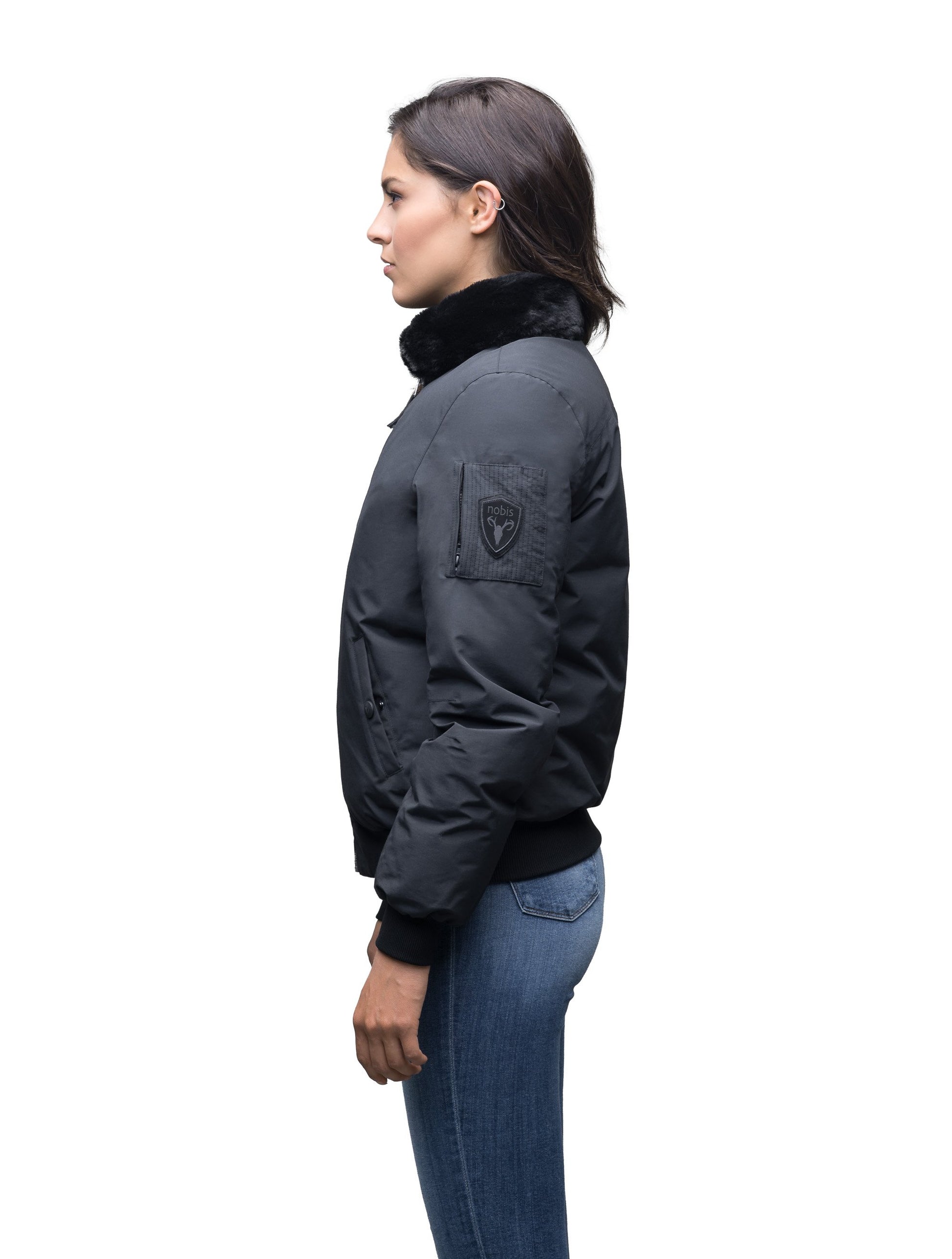 Women's hip length sleek down filled bomber jacket with removeable faux fur trim in Cy Black