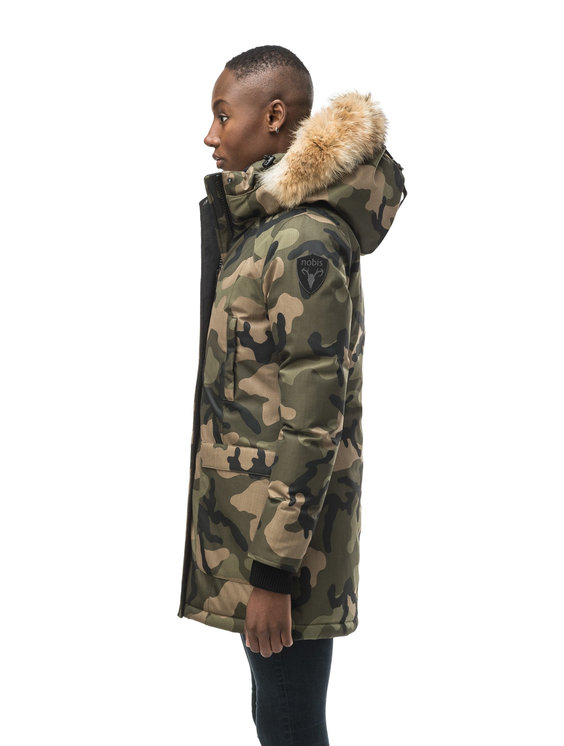 Women's down filled parka that sits just below the hip with a clean look and two hip patch pockets in CH Camo