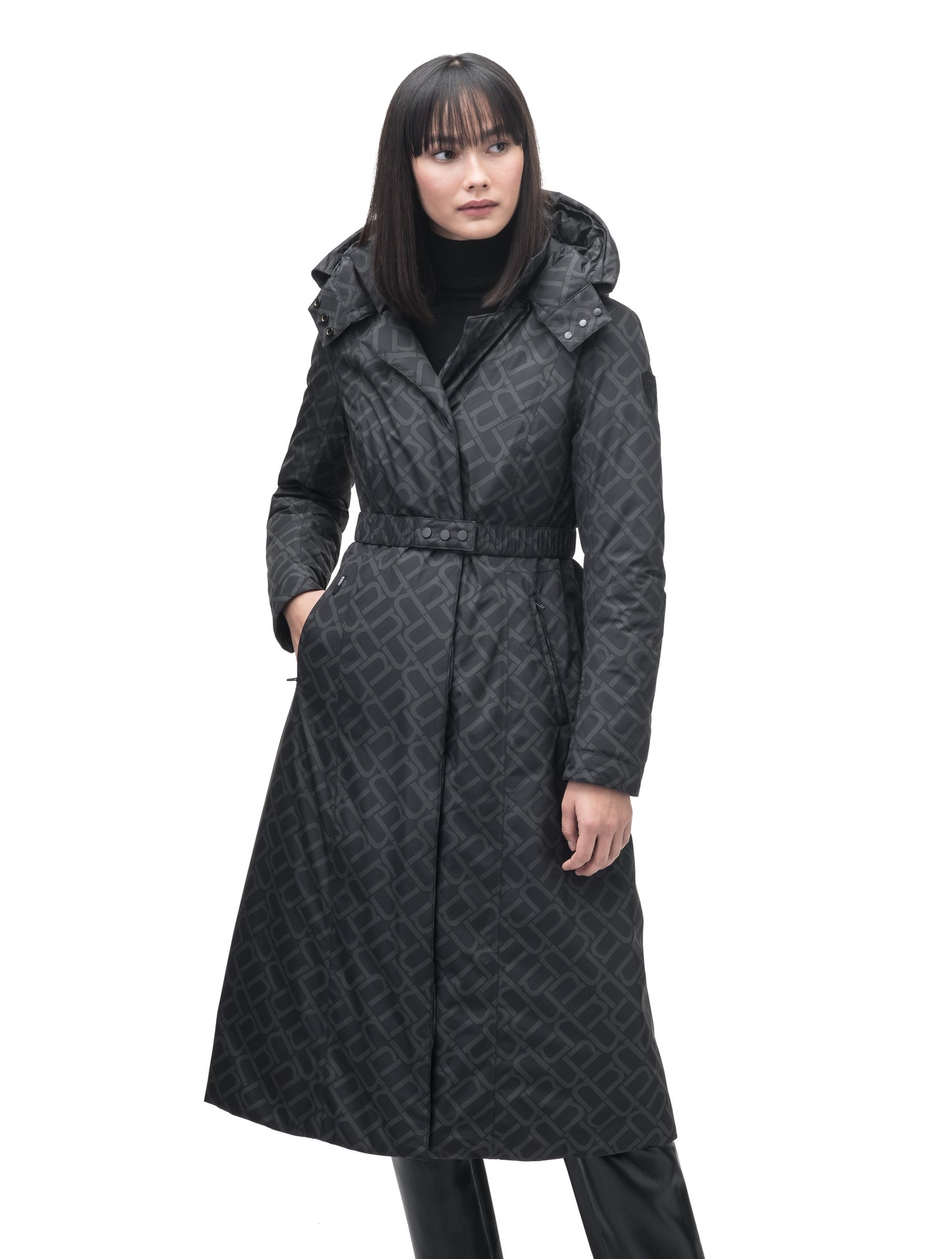 Celest Ladies Duster Parka in knee length, Canadian duck down insulation, removable hood and coyote fur trim, with adjustable belt, in Dark Monogram