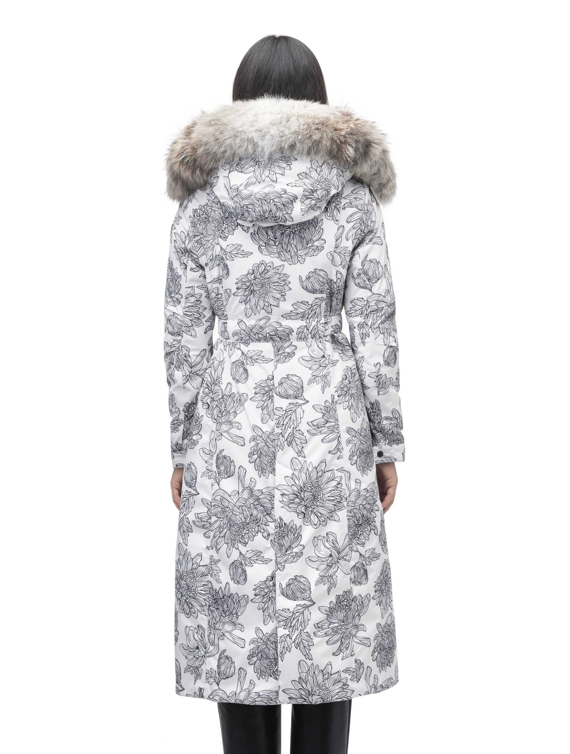 Celest Ladies Duster Parka in knee length, Canadian duck down insulation, removable hood and coyote fur trim, with adjustable belt, in White Floral