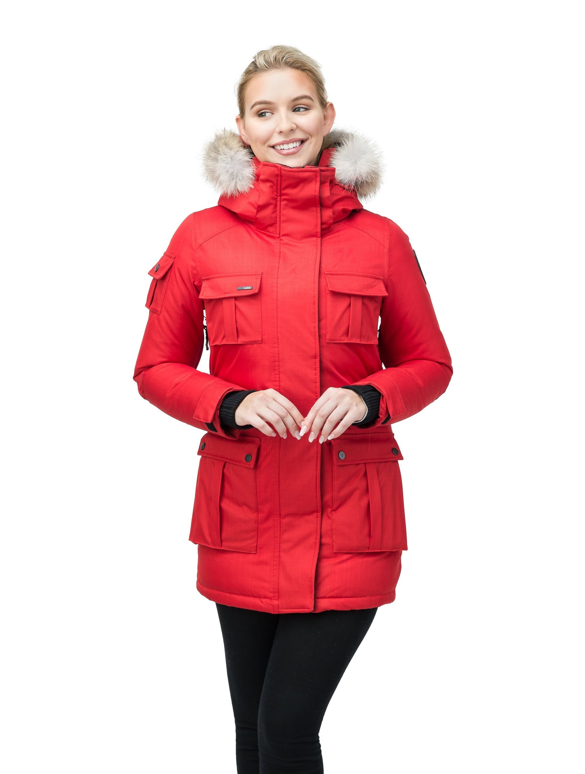 Women's down filled thigh length parka with four pleated patch pockets and an adjustable waist in CH Red