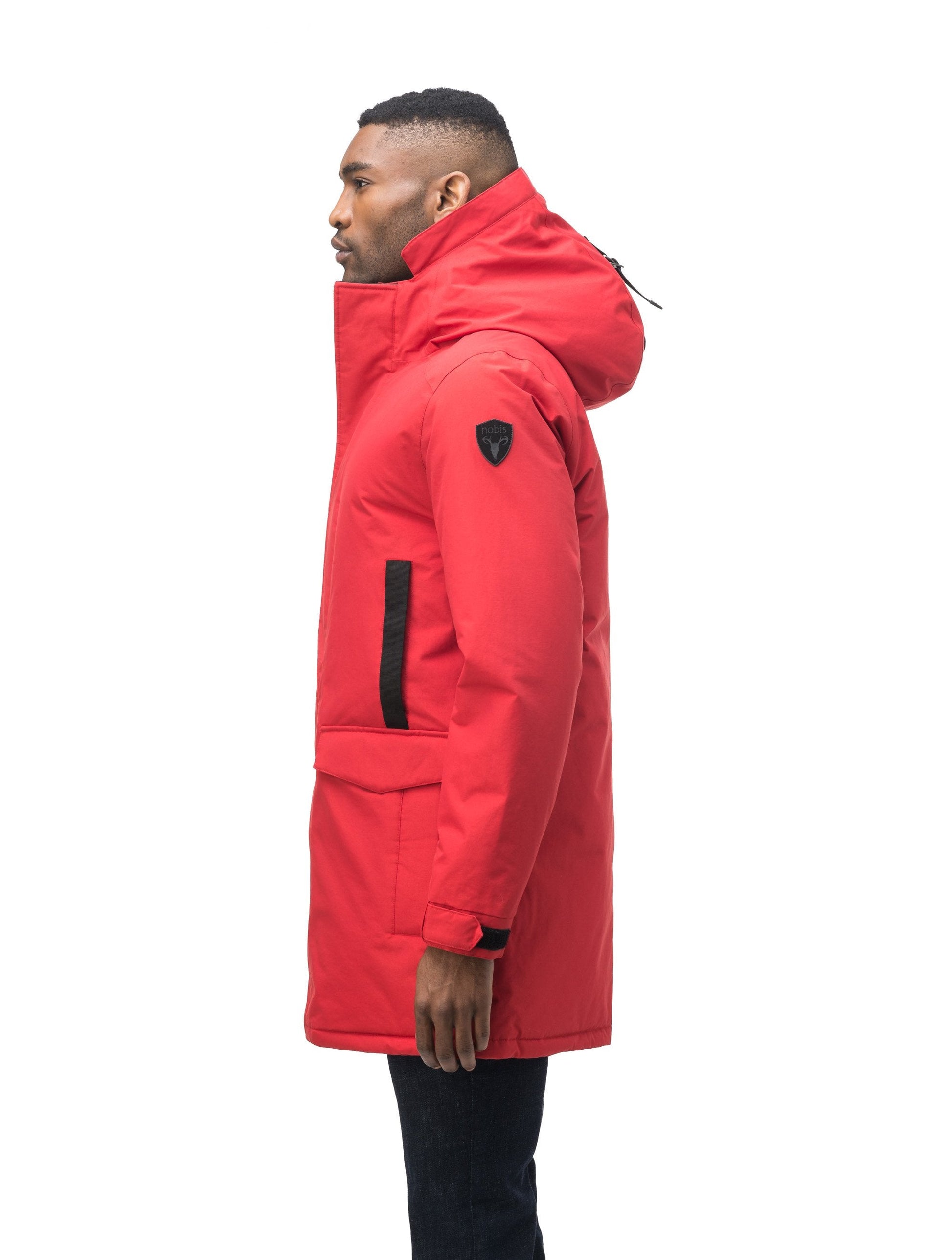 Lightweight men's parka with duck down fill and removable fur trim around the hood in Vermillion