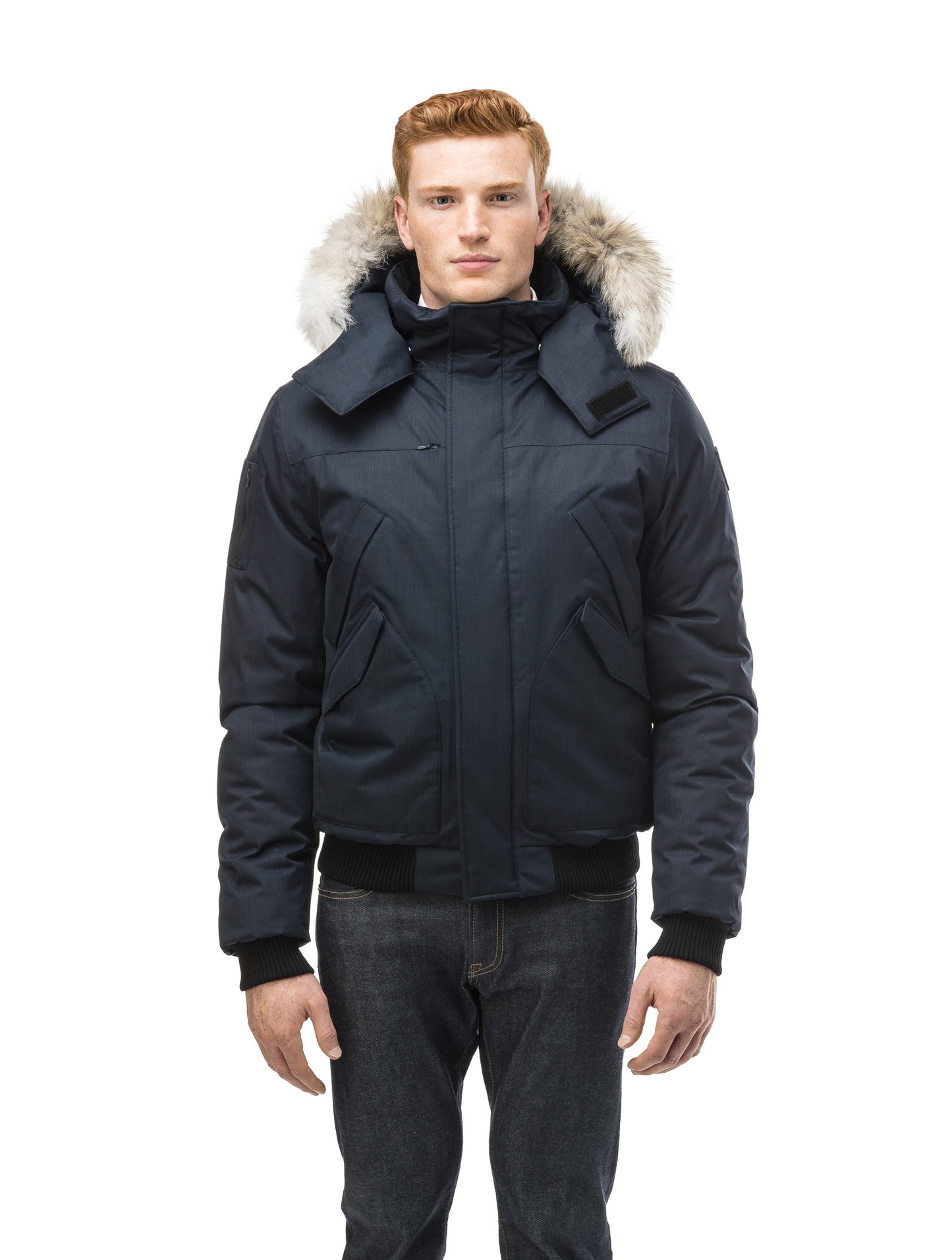 Men's classic down filled bomber jacket with a down filledÂ hood that features a removable coyote fur trim and concealed moldable framing wire in Navy