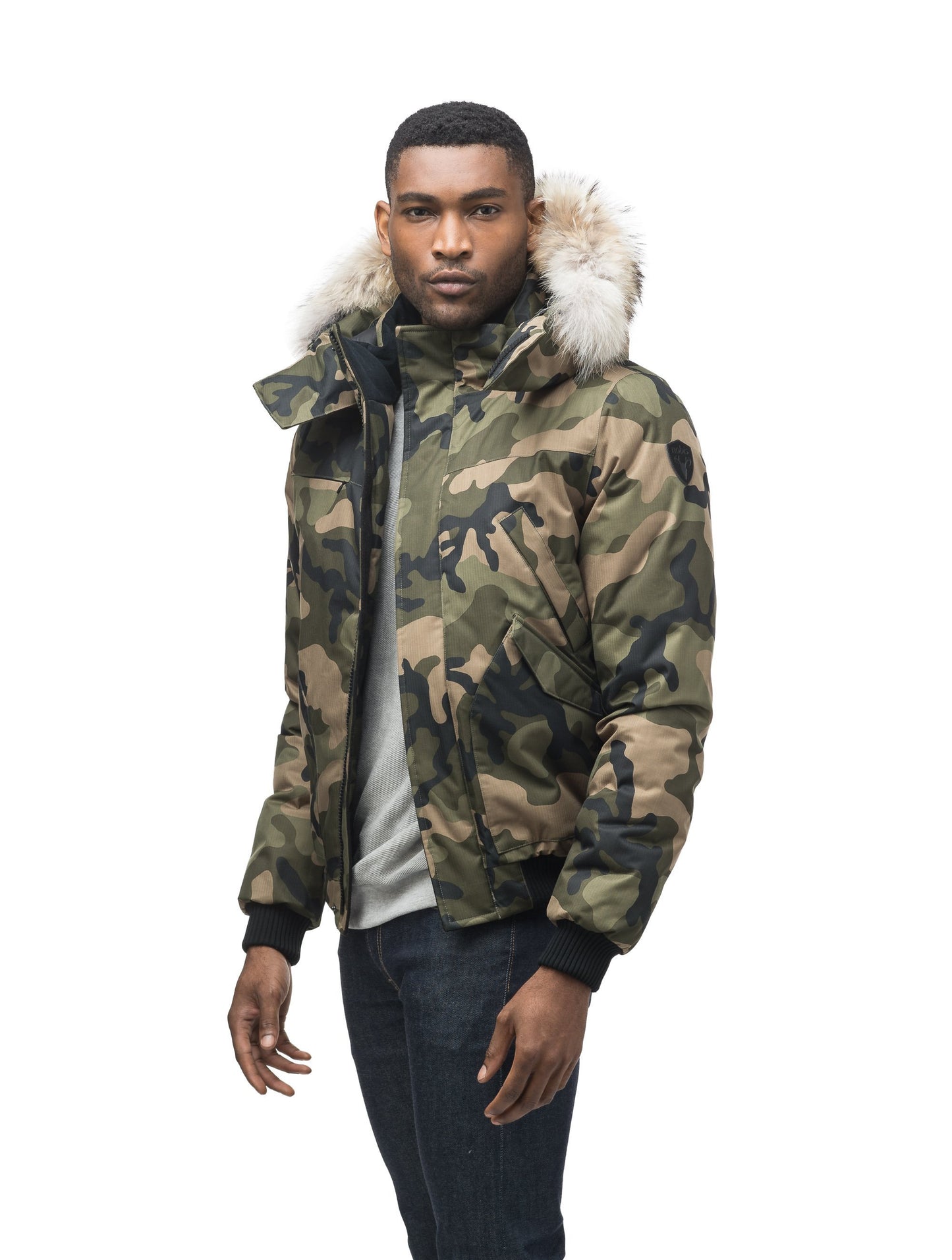 Men's classic down filled bomber jacket with a down filledÃƒâ€šÃ‚Â hood that features a removable coyote fur trim and concealed moldable framing wire in Camo