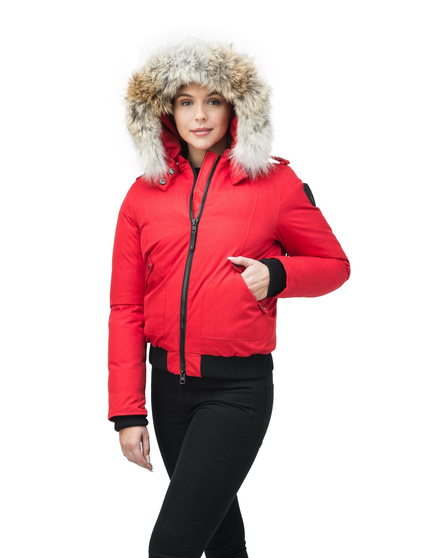 Women's bomber style down filled jacket with a removable hood and fur trim in CH Red