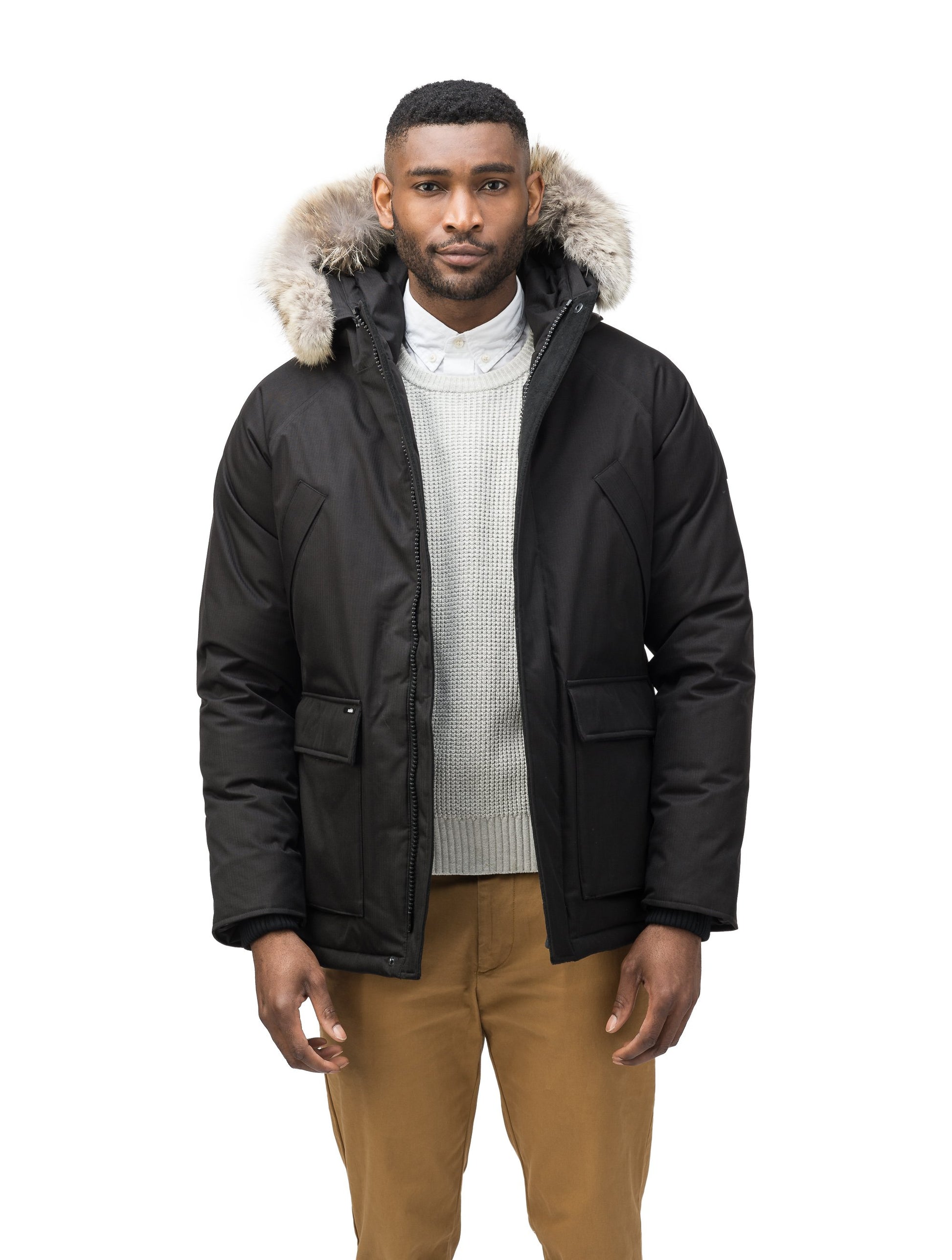 Men's waist length down filled jacket with two front pockets with magnetic closure and a removable fur trim on the hood in CH Black