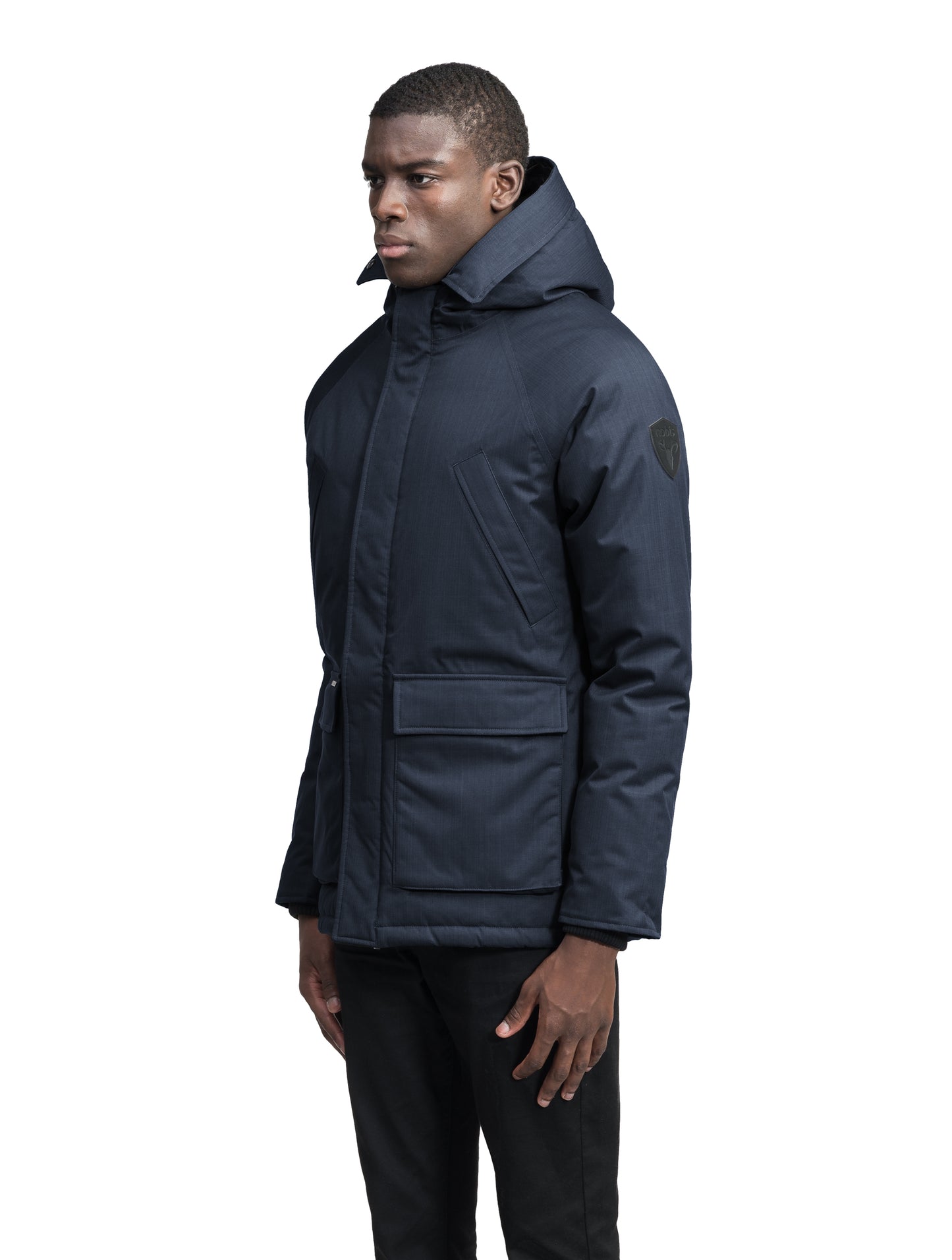 Heritage Furless Men's Parka in hip length, Canadian white duck down insulation, non-removable hood, front zipper with magnetic placket, chest hand warmer pockets, waist flap pockets, and elastic cuffs, in Navy