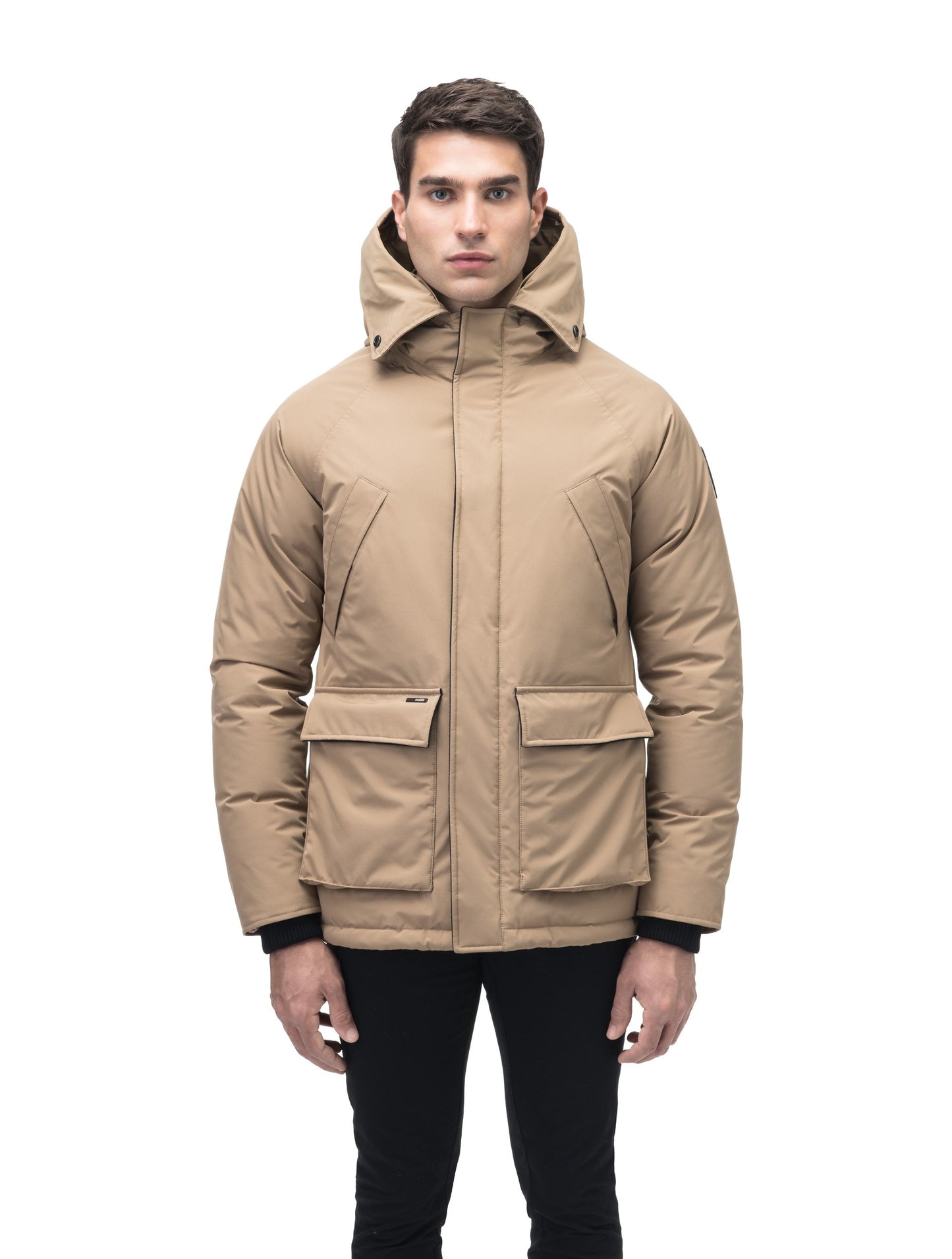 Men's waist length down filled jacket with two front pockets with magnetic closure and a removable fur trim on the hood in Cork