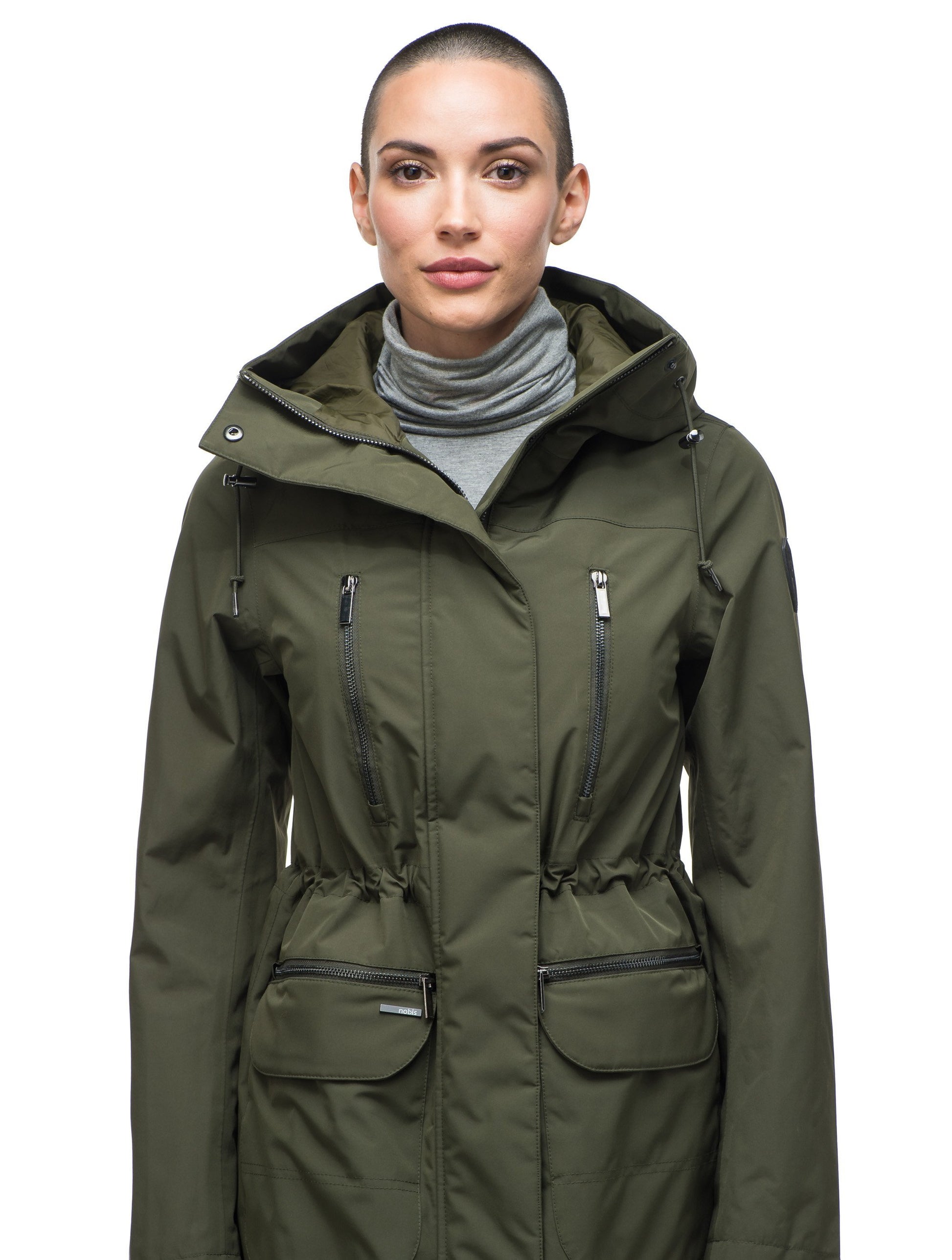 Women's knee length anorak with four front pockets and adjustable cord waist in Fatigue