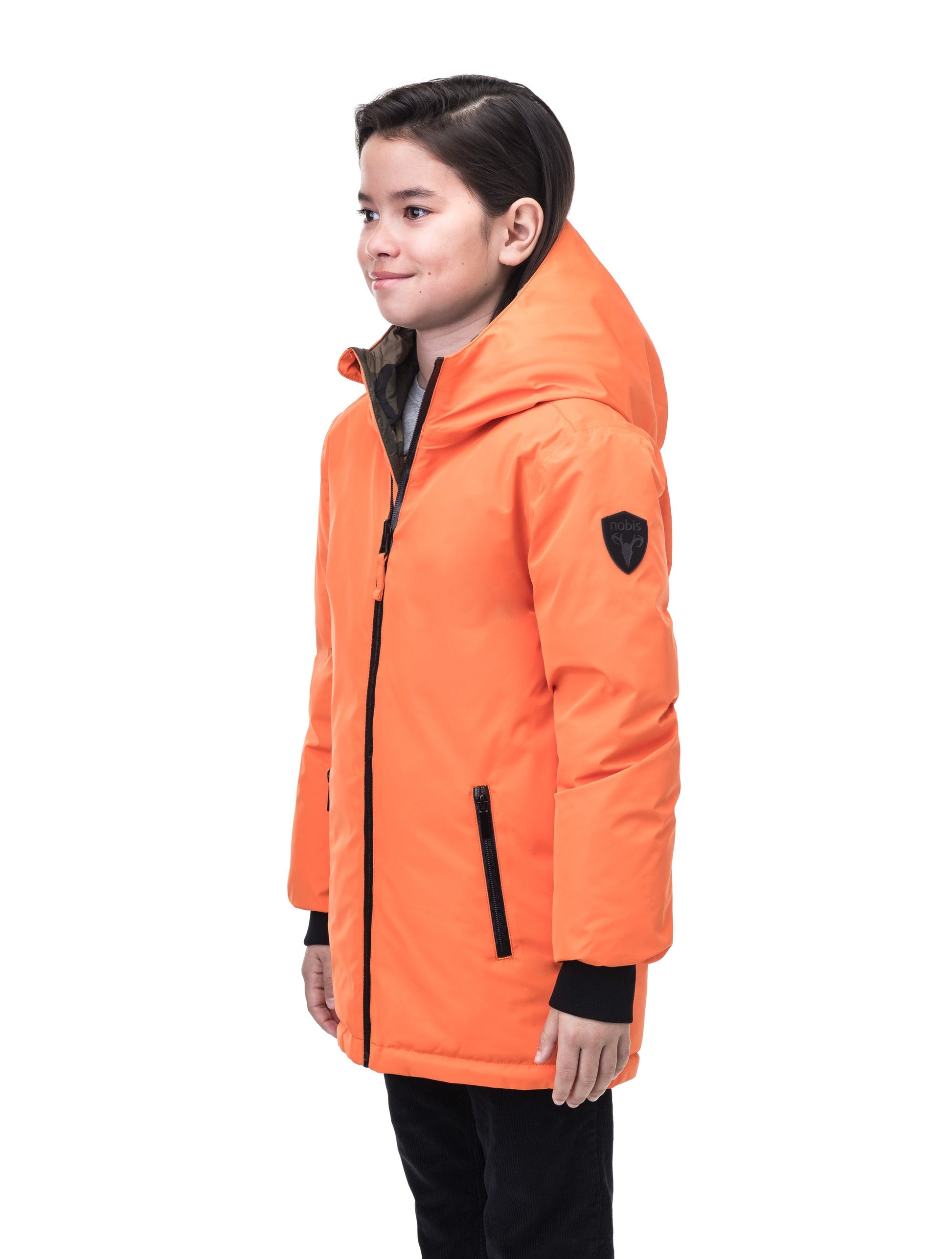 Kids' reversible knee length, down filled parka with waterproof finish in Atomic/Camo