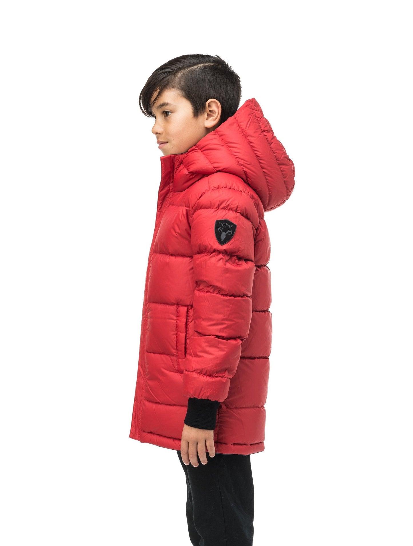 Kids' reversible knee length, down filled parka with waterproof finish in Navy Camo/Vermillion