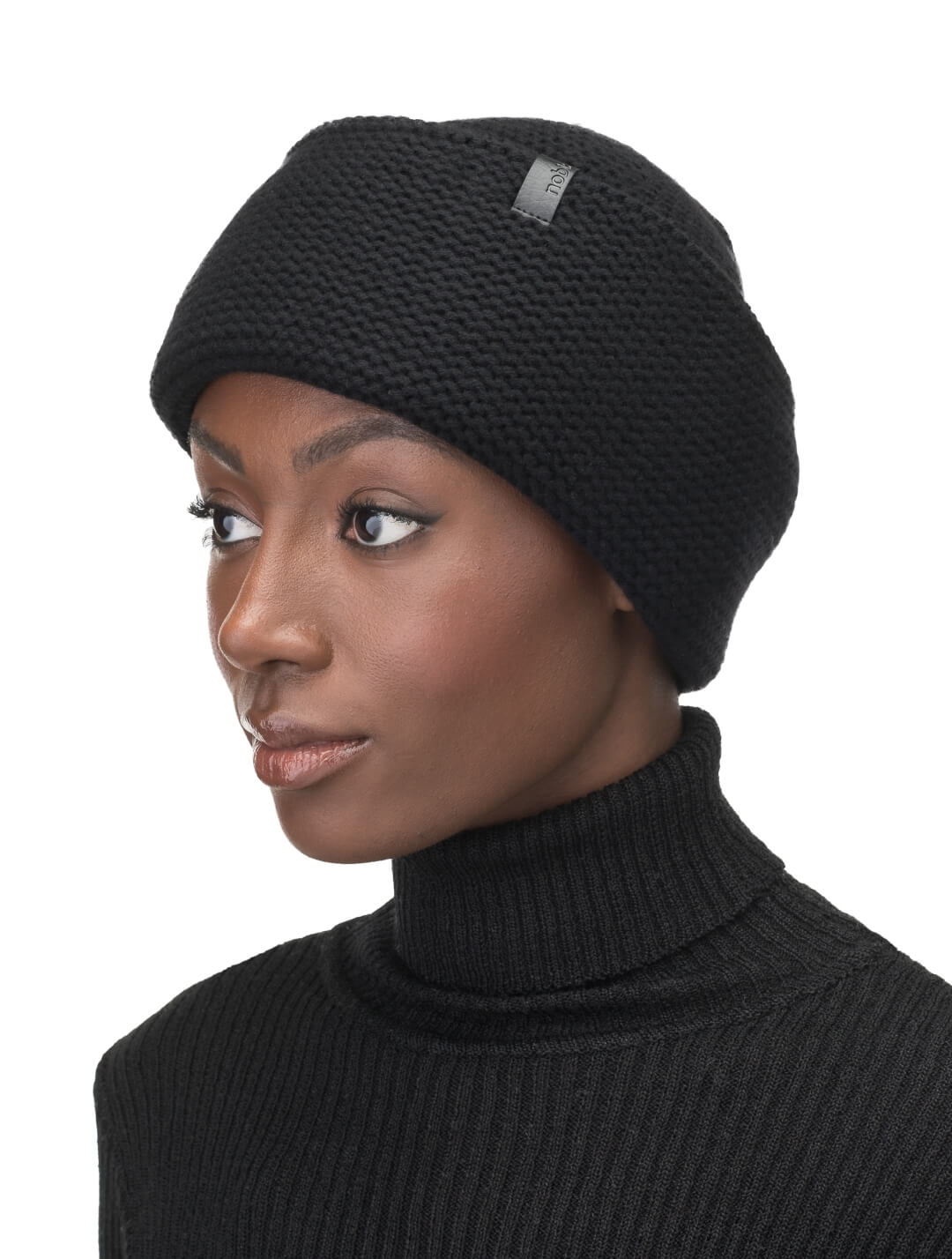 Mira Unisex Purl Knit Beanie in superfine merino wool and cashmere, and Nobis leather label at cuff, in Black