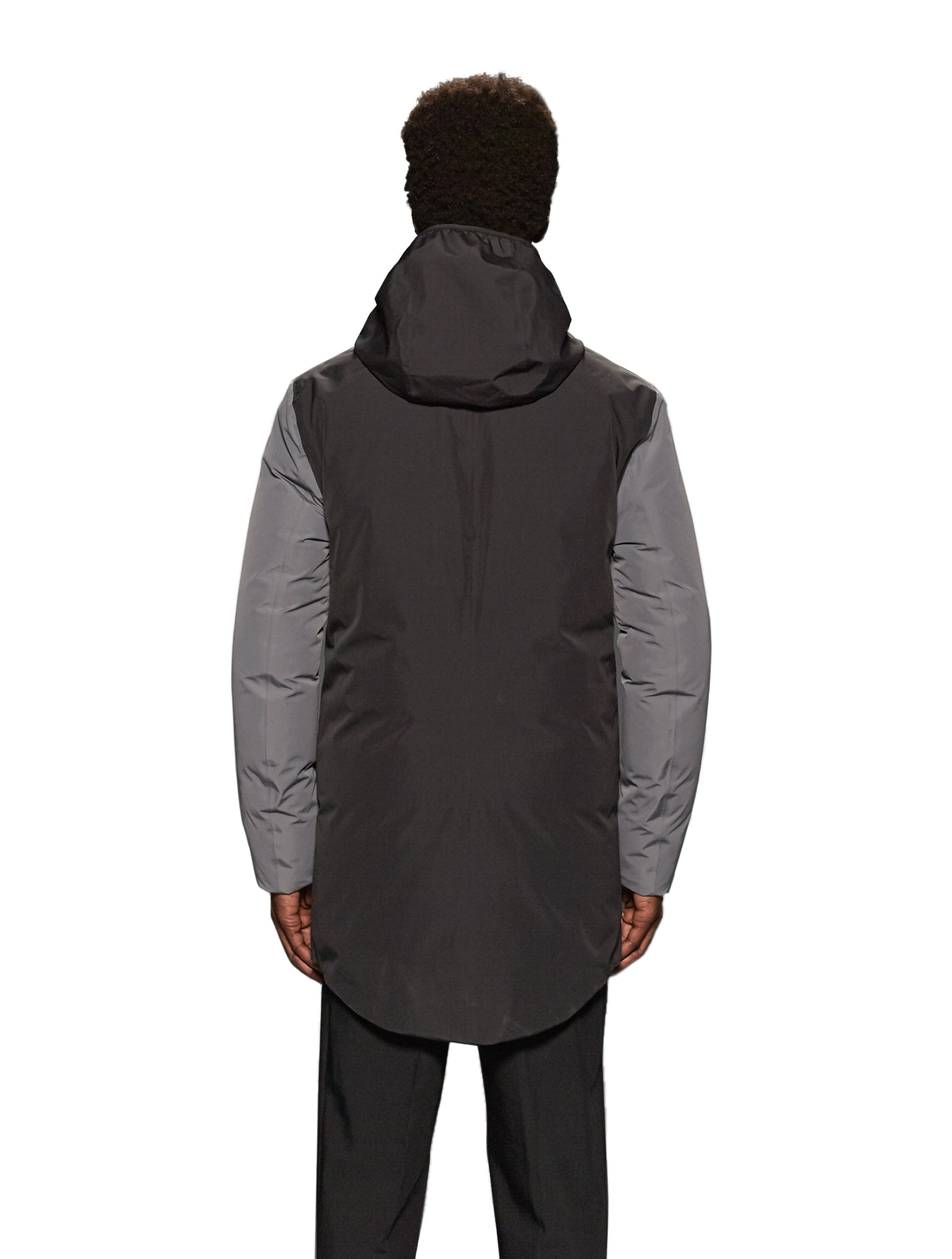 Unisex thigh length down parka with a contrast colour back panel, hidable waterproof hood, and hidden zipper pockets at chest and waist, in Concrete/Black