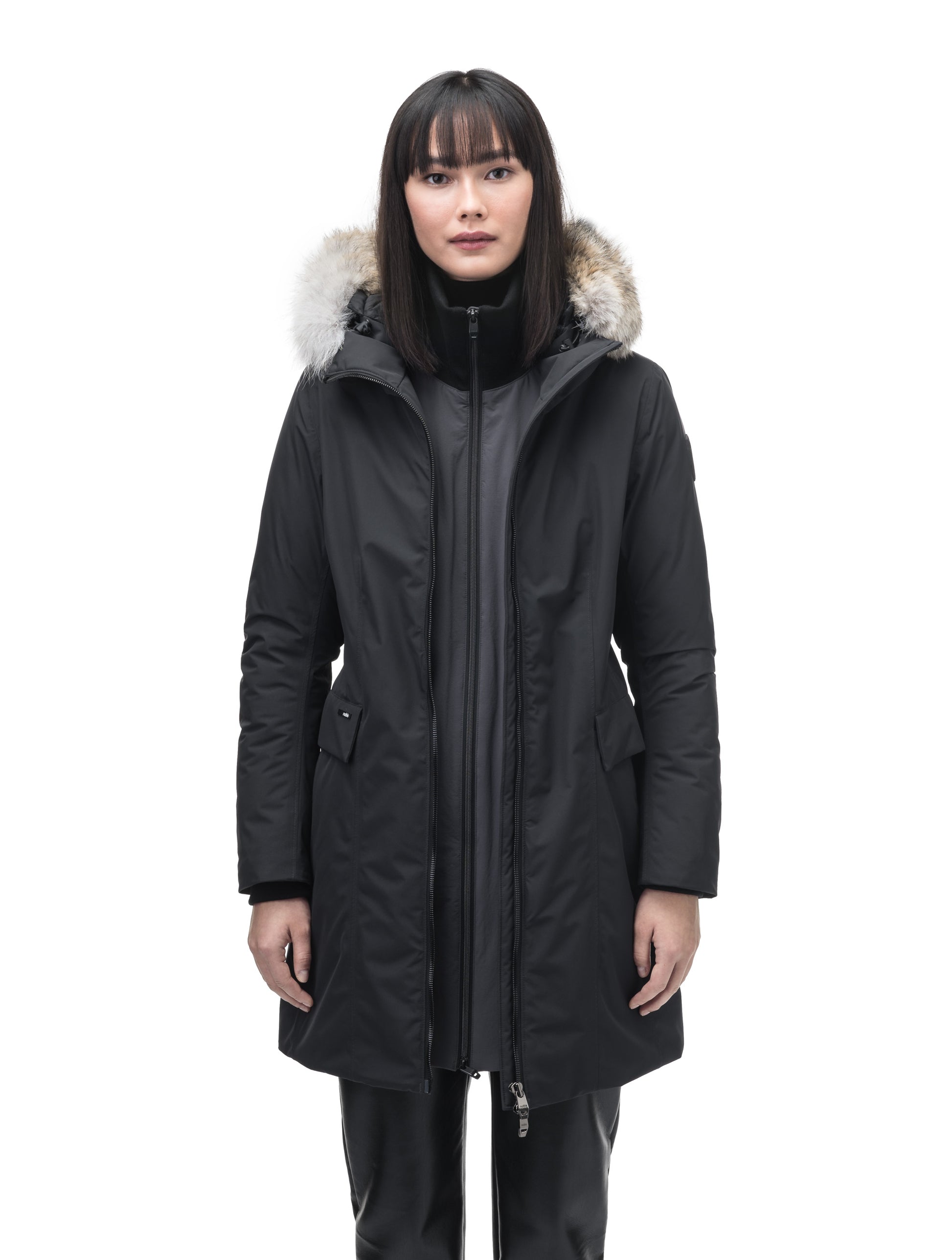 Romeda Ladies Mid Thigh Parka in thigh length, Canadian duck down insulation, non-removable hood with removable fur ruff trim, and two-way front zipper, in Black