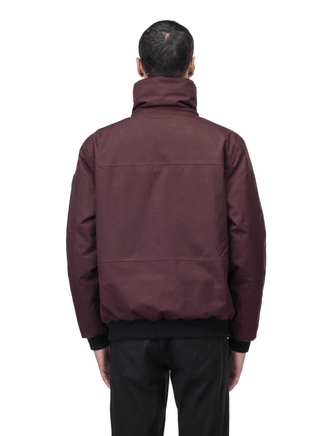 Men's sleek down filled bomber jacket with clean details and a fur free hood in Merlot