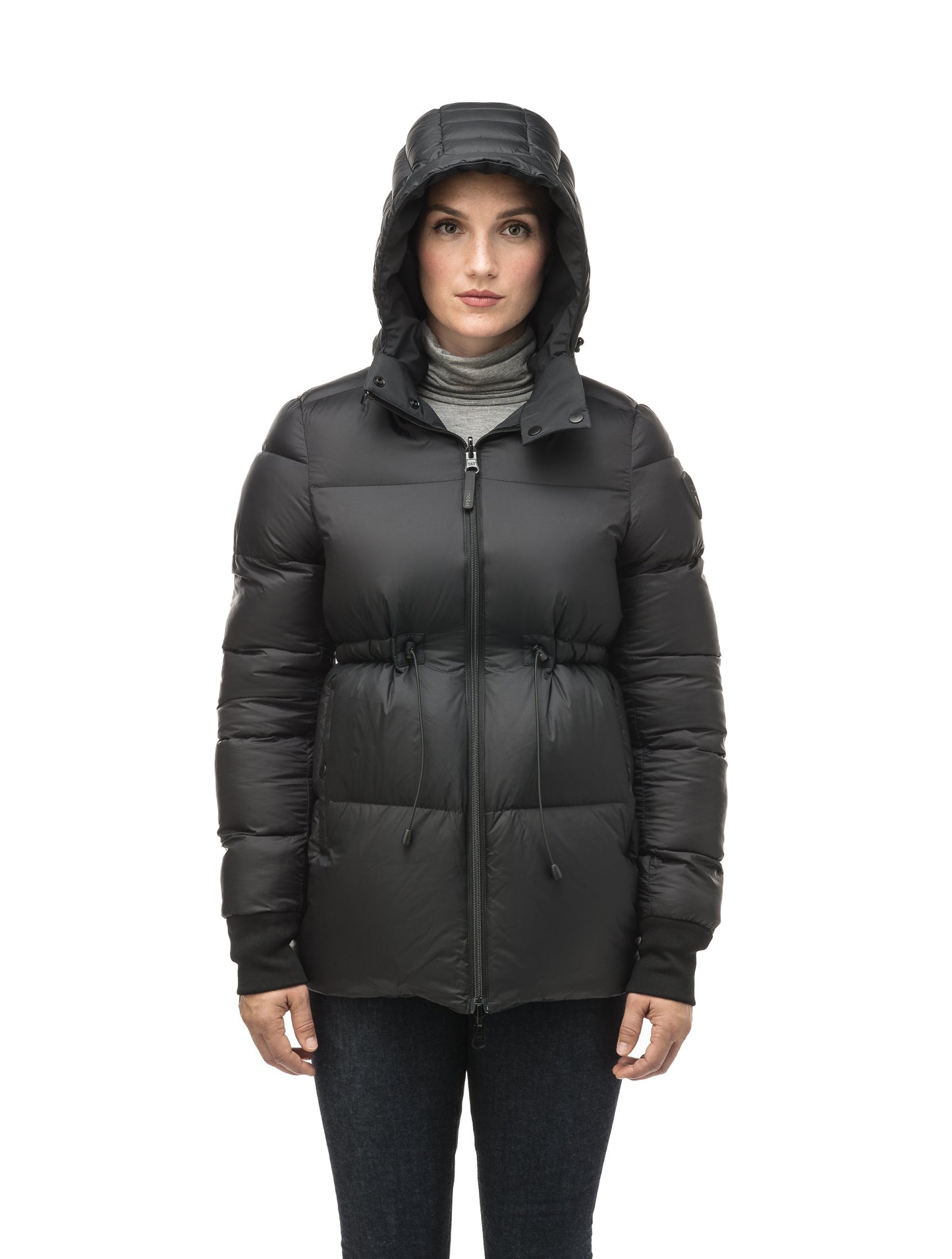 Hip length, reversible women's down filled jacket with waterproof exposed zipper in Black
