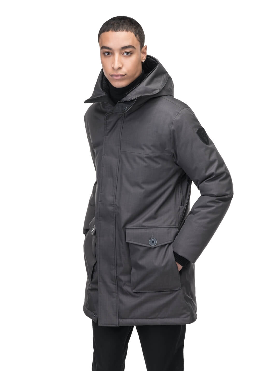 Yves Furless Men's Parka in thigh length, Canadian white duck down insulation, non-removable down-filled hood, flap pockets at waist, centre-front two-way zipper with magnetic wind flap, and elastic ribbed cuffs, in CH Steel Grey